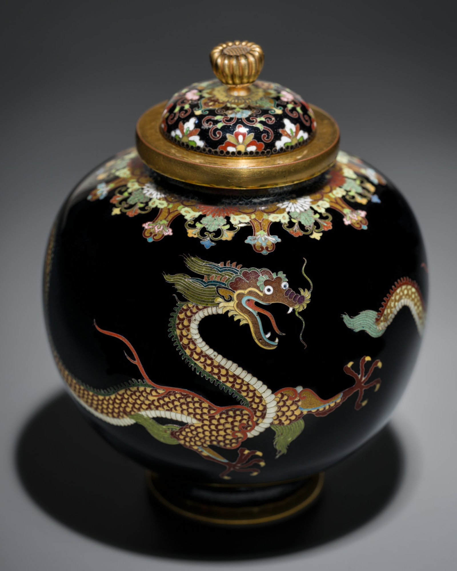 NAMIKAWA YASUYUKI: A MAGNIFICENT BLACK-GROUND CLOISONNE ENAMEL 'WRITHING DRAGONS' SPHERICAL JAR AND (1 of 20)