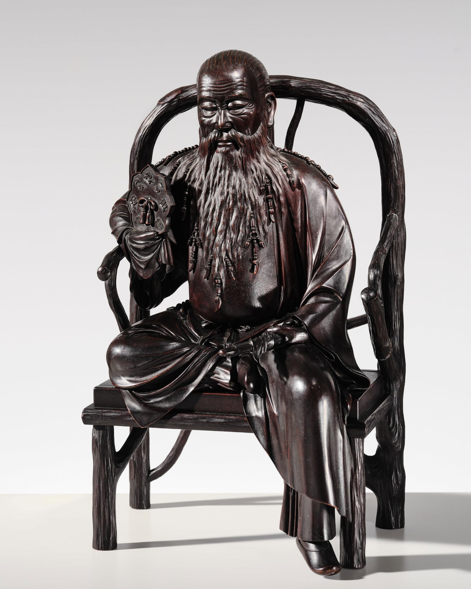 A SUPERB AND RARE LARGE WOOD OKIMONO OF A CHINESE ELDER (1 of 12)