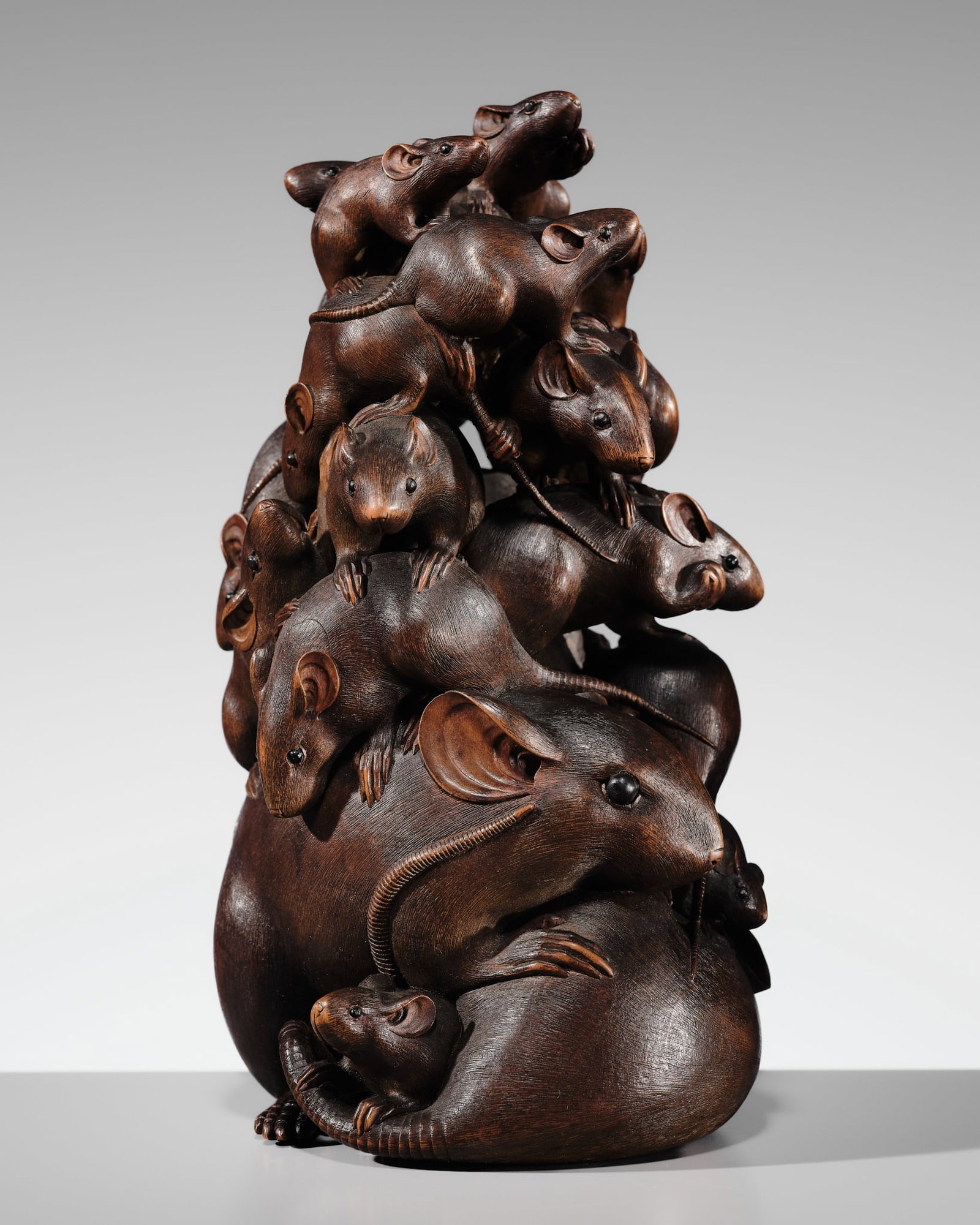 HOICHI: A SUPERB WOOD OKIMONO OF A PYRAMID OF TWENTY-ONE RATS: HOICHI: A SUPERB WOOD OKIMONO OF A PYRAMID OF TWENTY-ONE RATS By Sengetsudo Hoichi, signed Sengetsudo Hoichi to Japan, second half of the 19th century Carved with remarkable density and intricacy, th