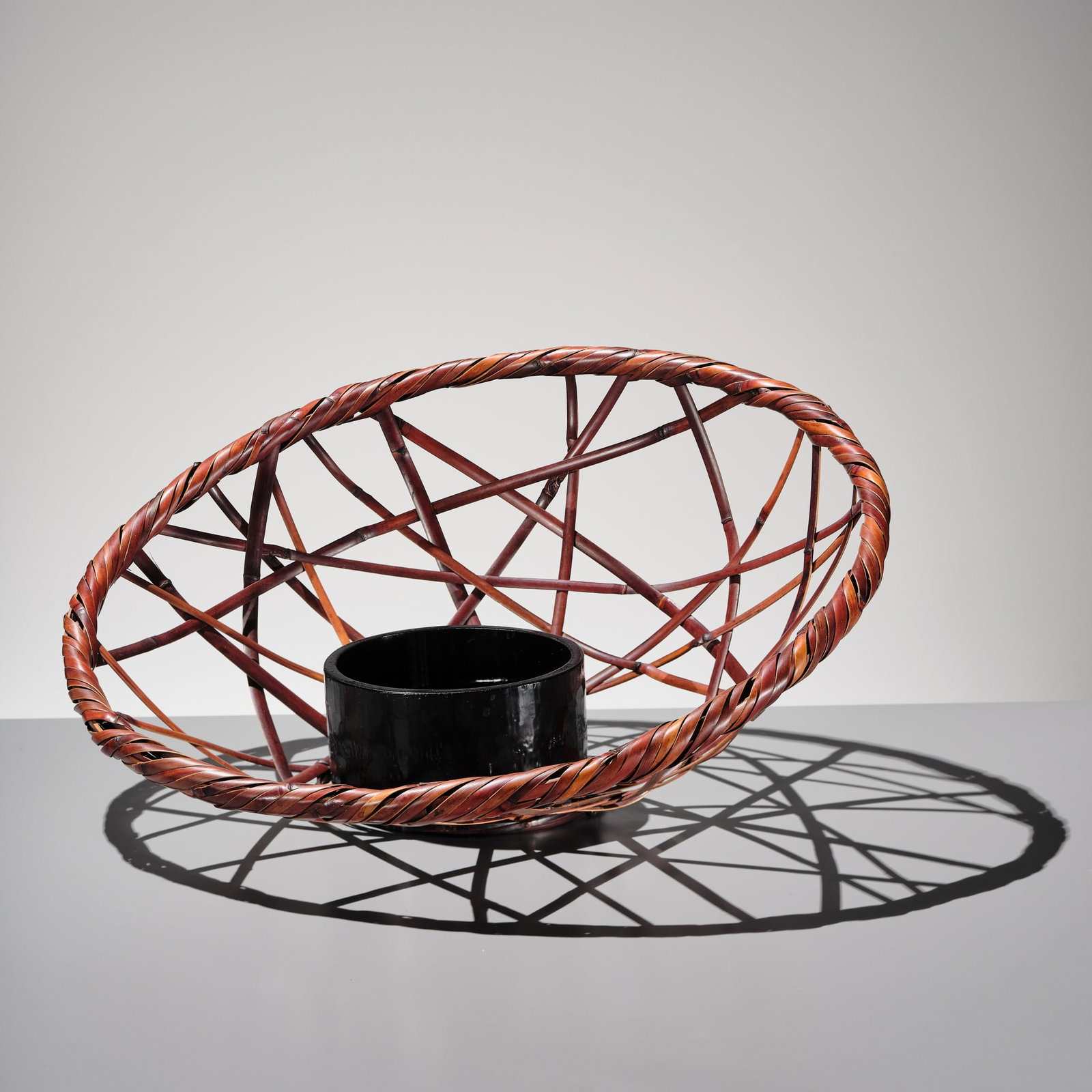 A BAMBOO AND RATTAN HANAKAGO (FLOWER BASKET), ATTRIBUTED TO IIZUKA ROKANSAI (1 of 12)