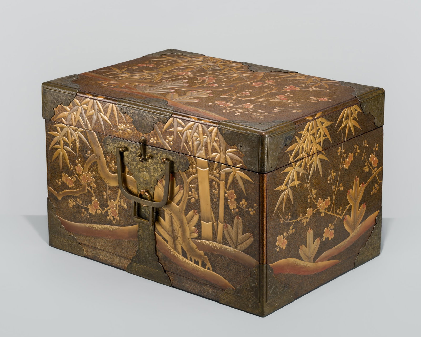 A RARE AND LARGE GOLD-LACQUER 'THREE FRIENDS OF WINTER' HASAMIBAKO (TRAVELING CHEST) (1 of 18)