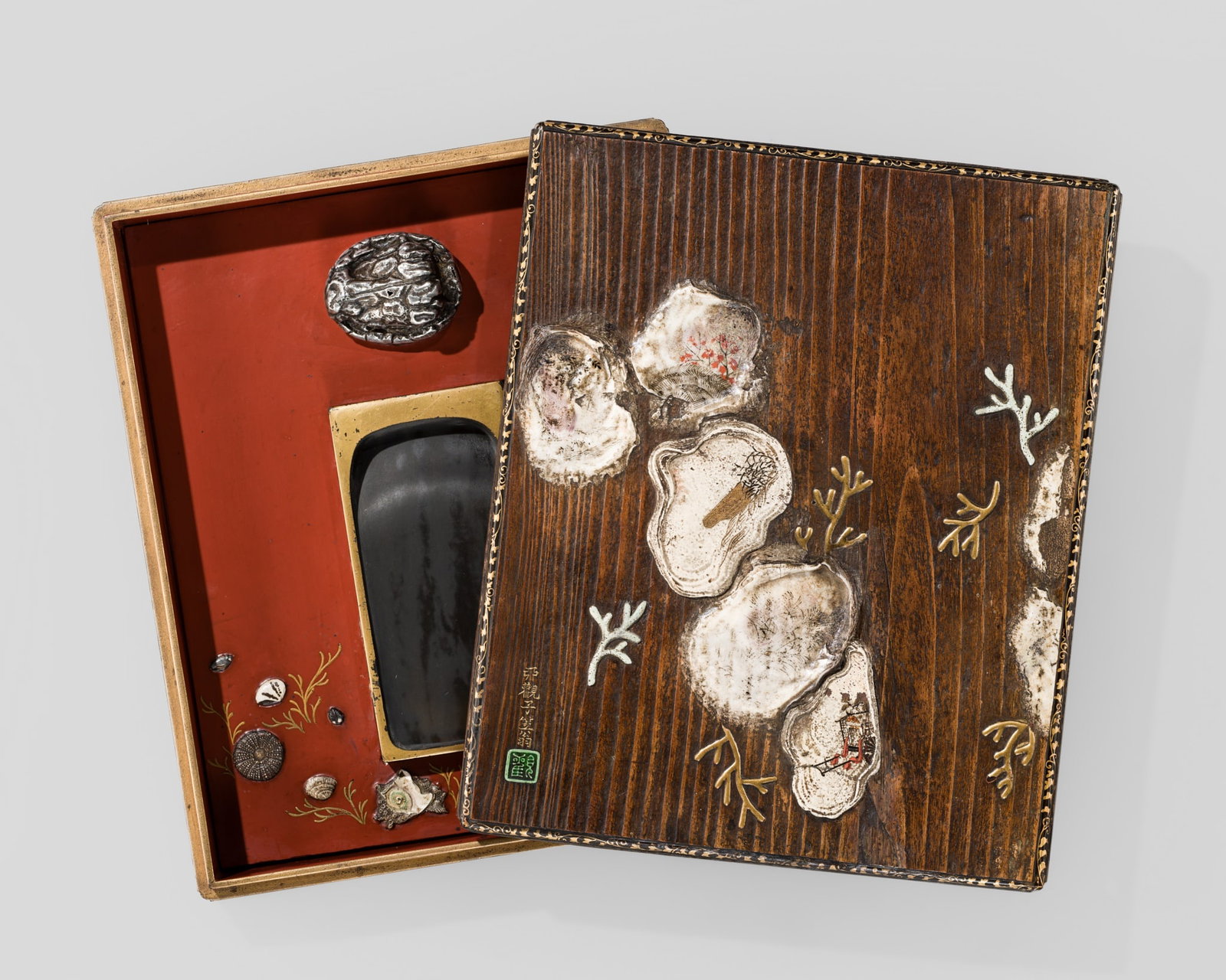 OGAWA HARITSU: A FINE INLAID WOOD 'KAI-AWASE SHELLS' SUZURIBAKO (WRITING BOX): OGAWA HARITSU: A FINE INLAID WOOD 'KAI-AWASE SHELLS' SUZURIBAKO (WRITING BOX) By Ogawa Haritsu (1664-1747) or a close follower, signed Ukanshi Ritsuo with seal Kan Japan, 18th century, Edo period (161