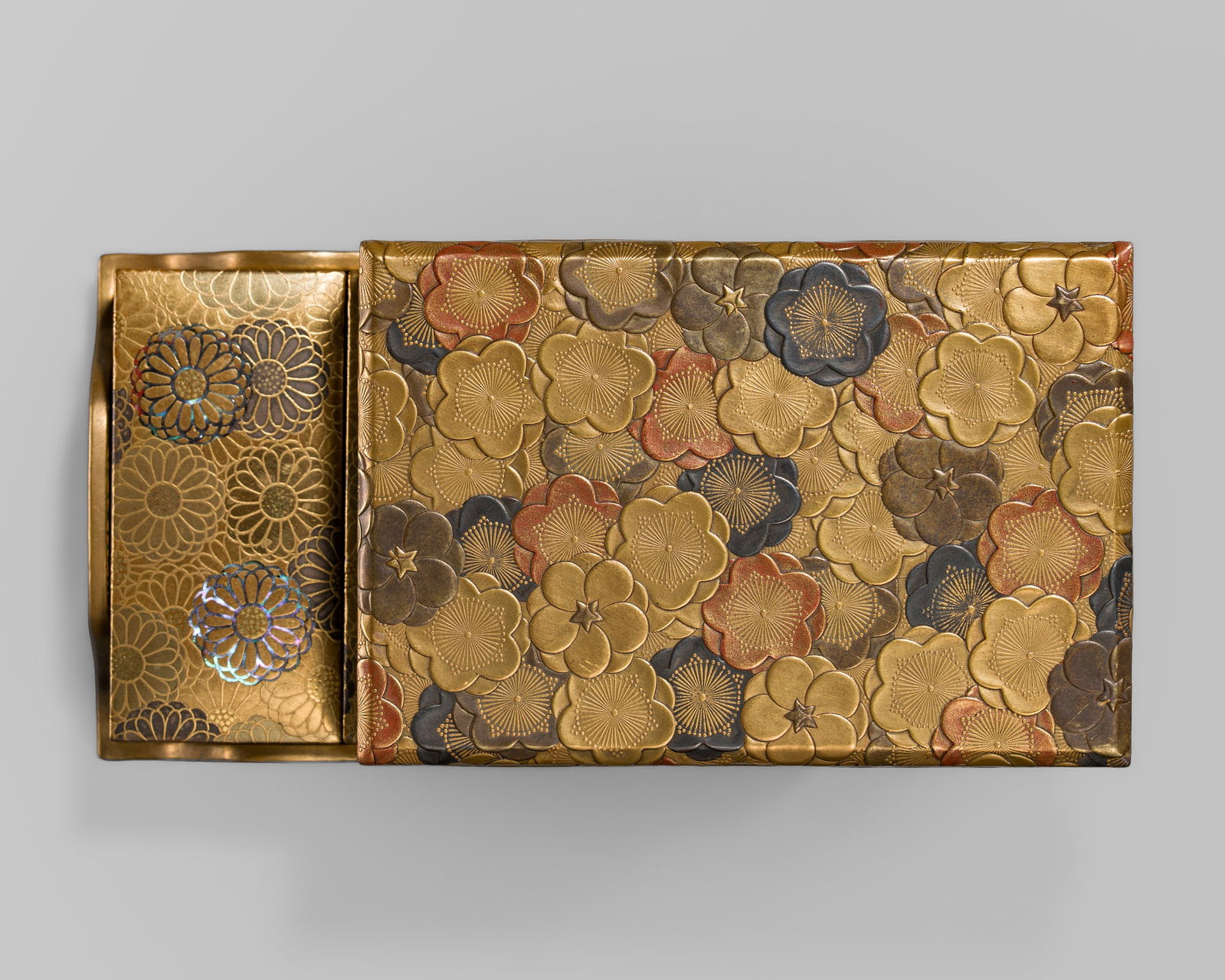 A FINE GOLD LACQUER 'CHERRY AND CHRYSANTHEMUMS' KOBAKO (SMALL BOX) WITH THREE KOGO, FOR THE INCENSE: A FINE GOLD LACQUER 'CHERRY AND CHRYSANTHEMUMS' KOBAKO (SMALL BOX) WITH THREE KOGO, FOR THE INCENSE MATCHING GAME Japan, 19th century Of rectangular form, surmounted by a flush-fitting cover with an u