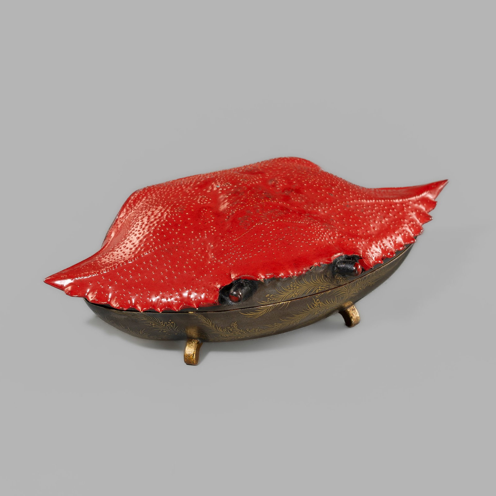 AN UNUSUAL RED LACQUER 'SAMURAI CRAB' KOGO (INCENSE BOX): AN UNUSUAL RED LACQUER 'SAMURAI CRAB' KOGO (INCENSE BOX) Japan, first half of the 20th century, Taisho (1912-1926) to Showa era (1926-1989) In the shape of a heikegani (samurai crab) rising on four fe