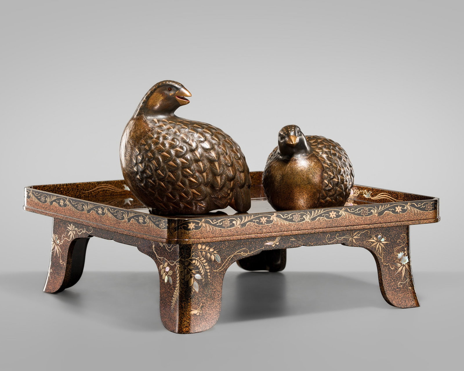 ROKKAKU SHISUI: A MAGNIFICENT 'RADEN' LACQUER BANQUET TRAY WITH A PAIR OF LACQUER 'QUAIL' OKIMONO (1 of 20)