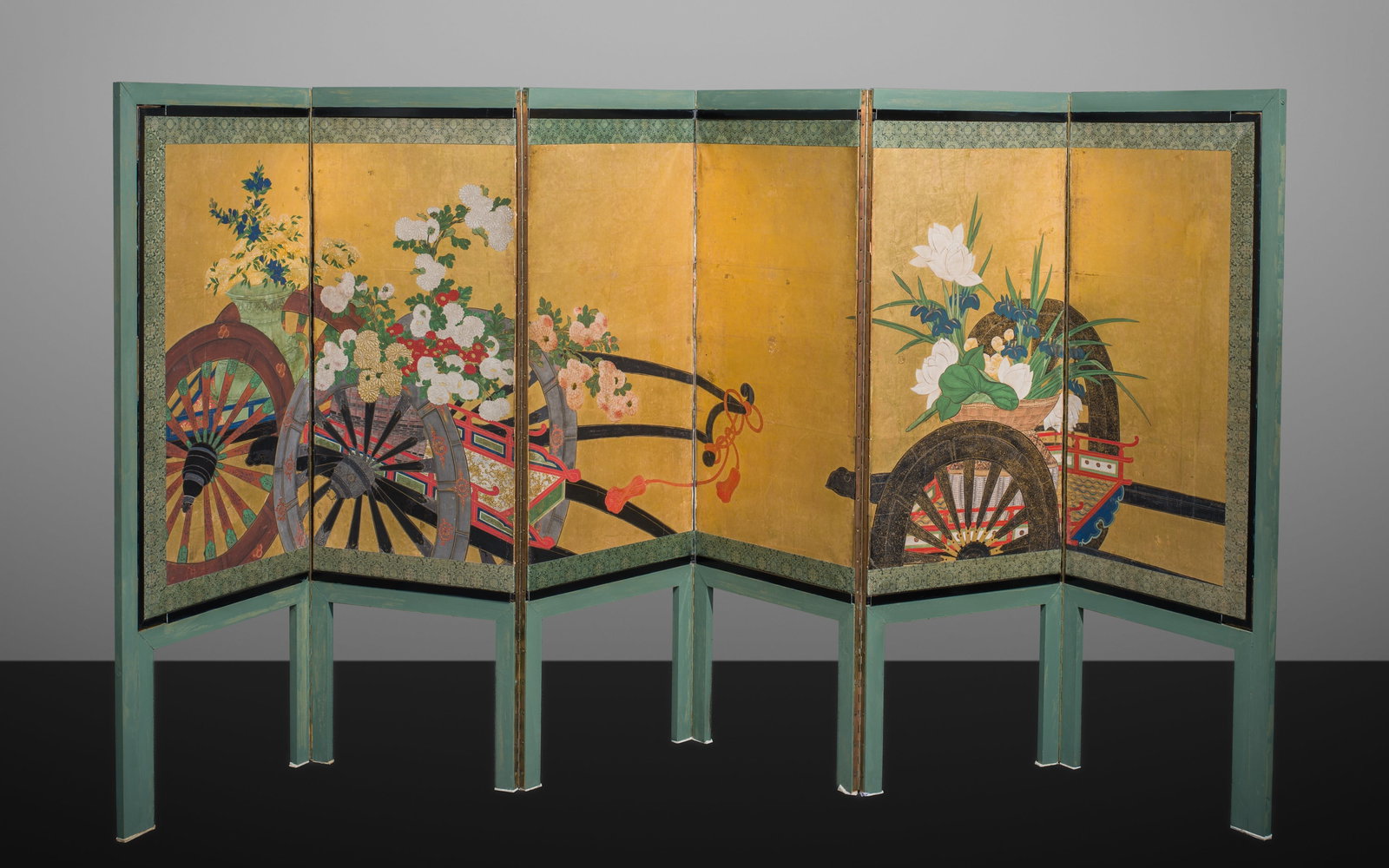 A SUPERB KANO SCHOOL SIX-PANEL 'FLOWER CARTS (HANAGURUMA)' BYOBU (FOLDING SCREEN): A SUPERB KANO SCHOOL SIX-PANEL 'FLOWER CARTS (HANAGURUMA)' BYOBU (FOLDING SCREEN) Japan, late 17th to early 18th century, Edo period (1615-1868) Ink, watercolors, gouache, gold paint, and gold leaf on