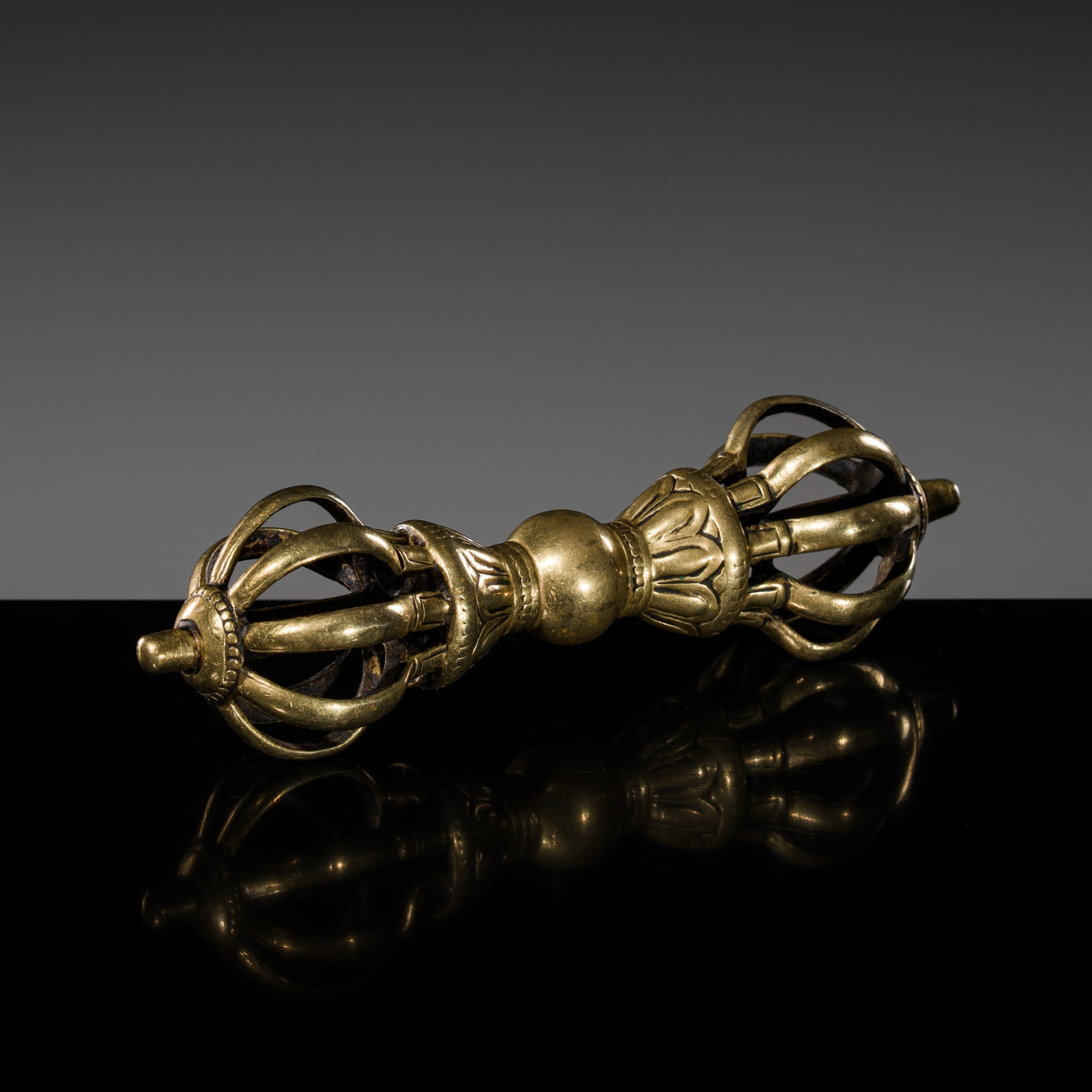 A BRONZE SIX-PRONGED VAJRA, DORJE, TIBET, CIRCA 17TH CENTURY (1 of 10)