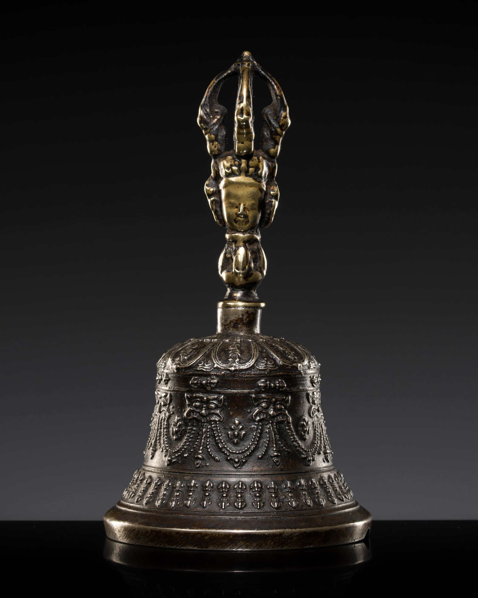 A SILVER AND BRONZE RITUAL BELL, GHANTA, TIBET, 19TH CENTURY AND EARLIER (1 of 13)