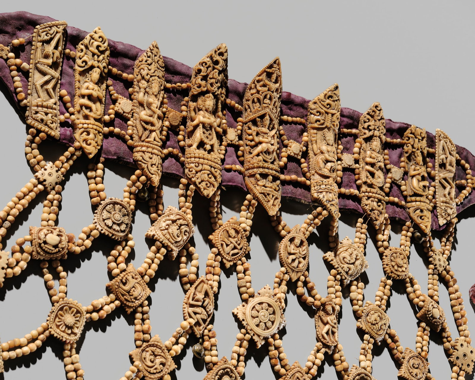 A RITUAL 'SKY WALKER' BONE APRON, 18TH-19TH CENTURY (1 of 14)