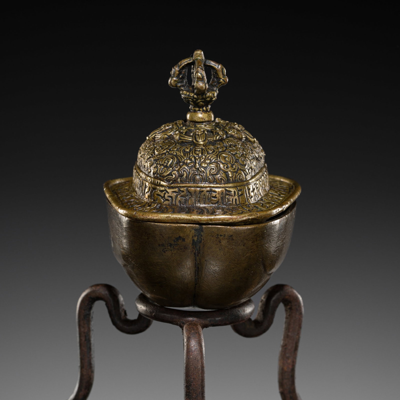 A COPPER REPOUSSÉ KAPALA AND STAND, TIBET, 18TH-19TH CENTURY (1 of 12)