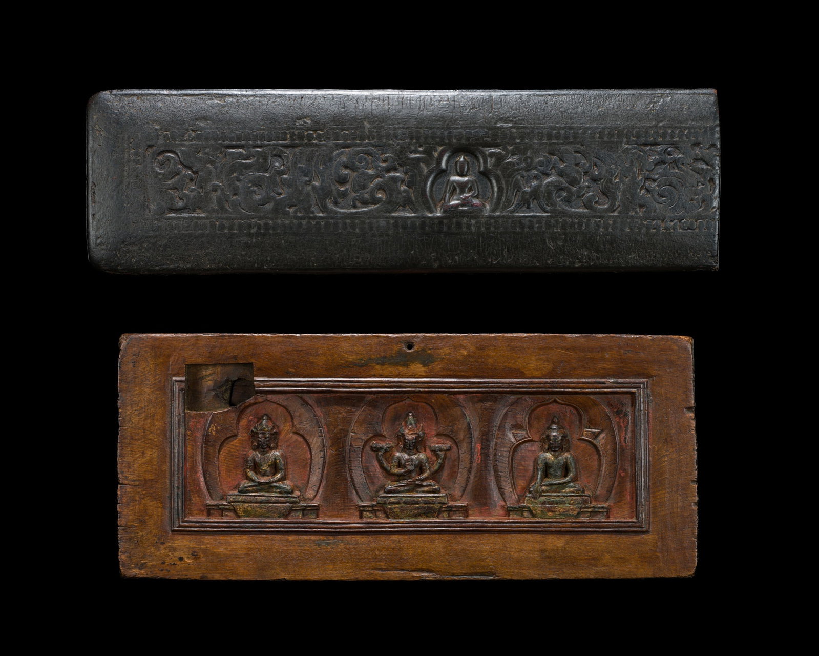 A GROUP OF TWO CARVED WOOD MANUSCRIPT COVERS, TIBET, CIRCA 12TH-13TH CENTURY (1 of 19)