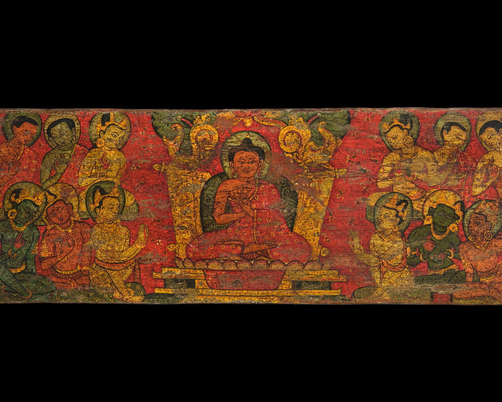 A PAINTED WOOD MANUSCRIPT COVER DEPICTING THE FIRST SERMON OF BUDDHA, NEPAL, CIRCA 16TH CENTURY (1 of 12)
