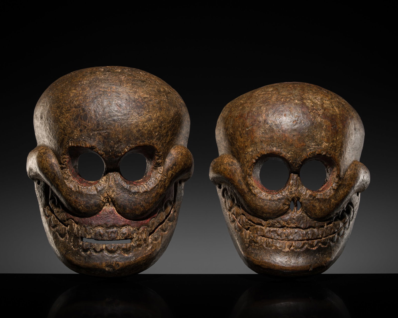 A PAIR OF WOOD MASKS OF CHITIPATI, TIBET, 19TH CENTURY (1 of 17)