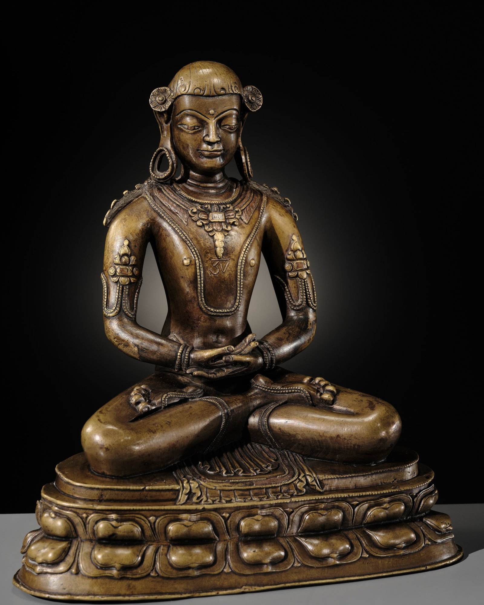 A RARE COPPER AND SILVER-INLAID BRONZE FIGURE OF KUNZANG AKOR, TIBET, 13TH-14TH CENTURY (1 of 13)
