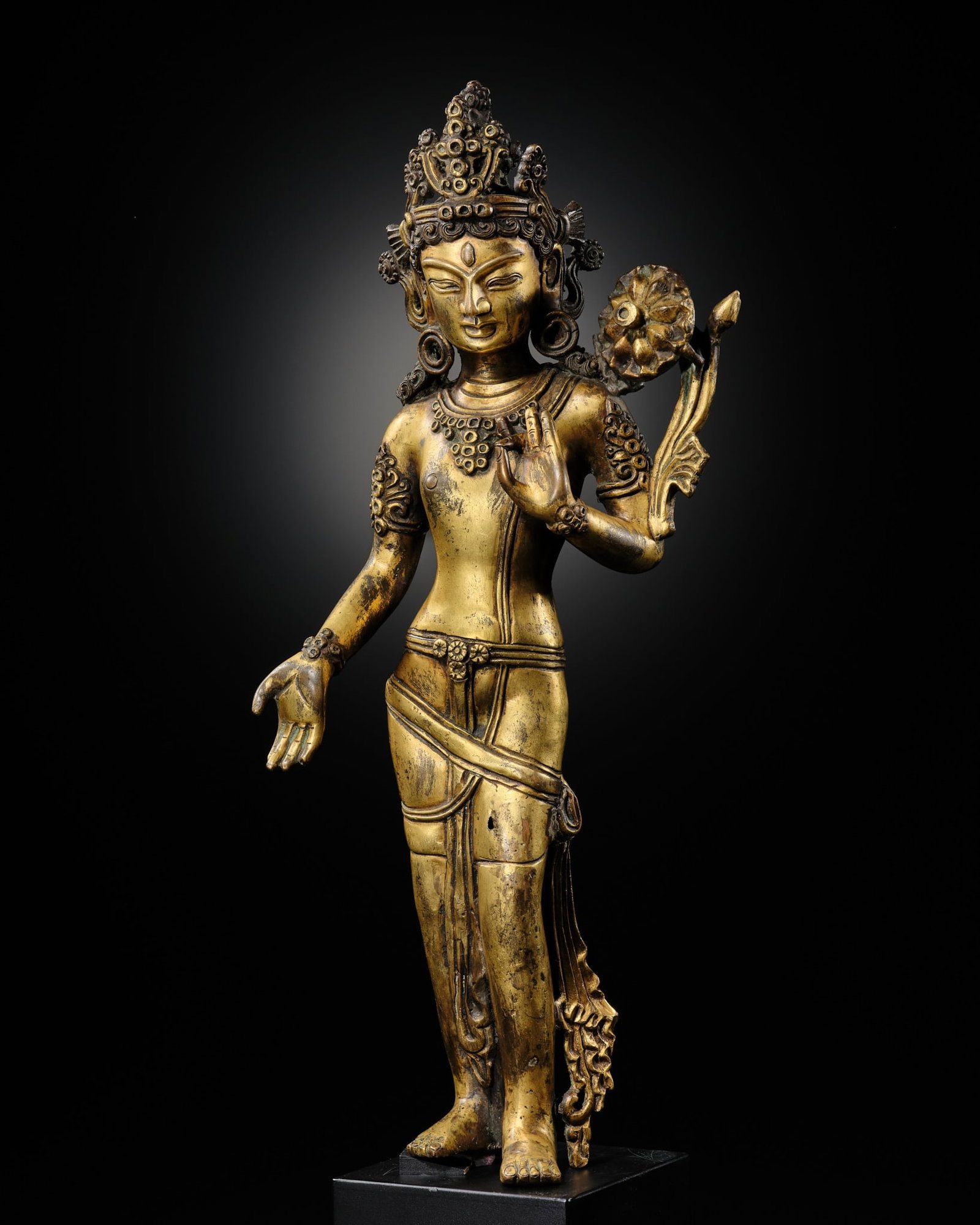 A LARGE GILT-BRONZE FIGURE OF PADMAPANI AVALOKITESHVARA, NEPAL, 18TH CENTURY OR EARLIER (1 of 12)