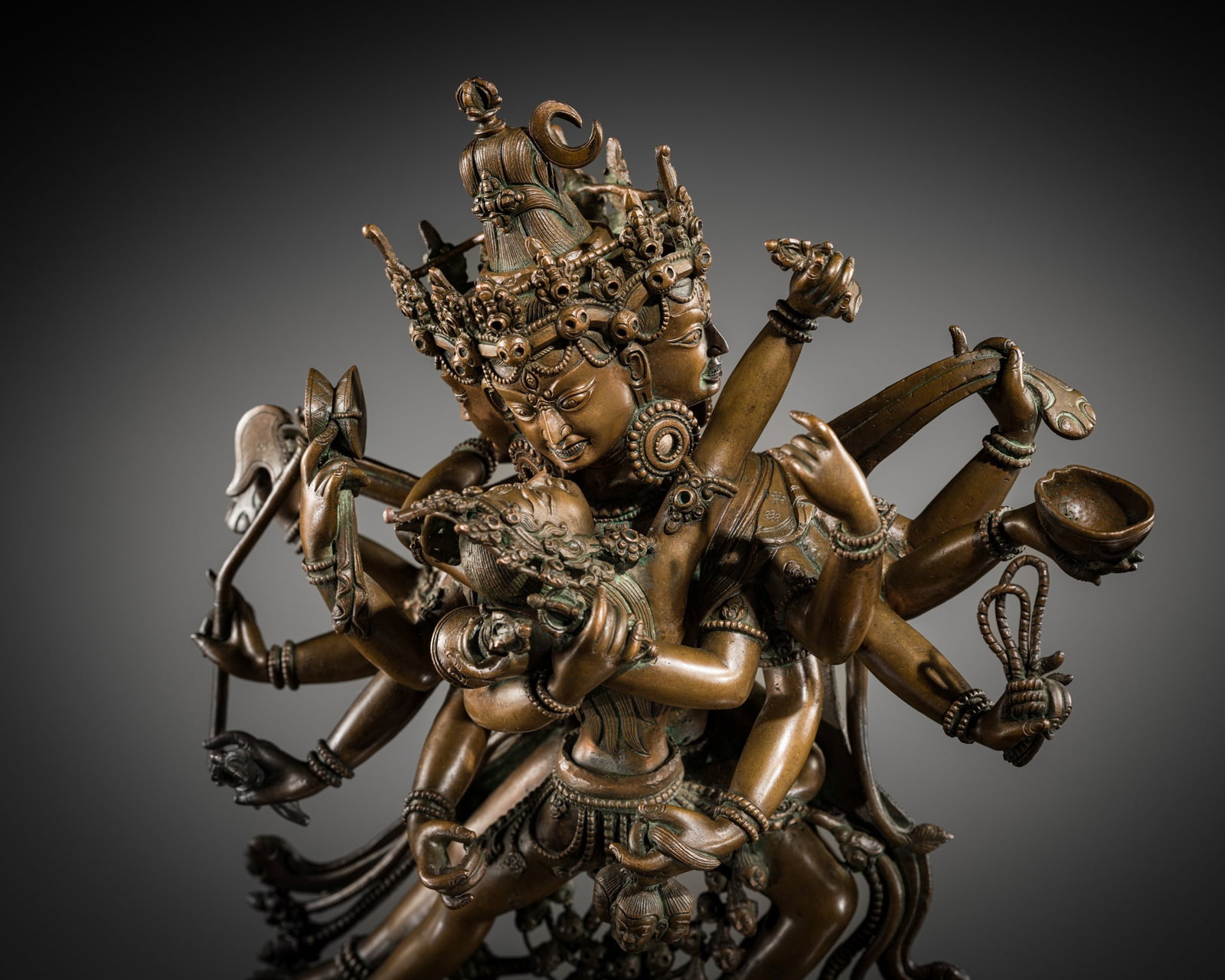 A LARGE COPPER ALLOY FIGURE OF CHAKRASAMVARA AND VAJRAVARAHI, NEPAL, 18TH-19TH CENTURY (1 of 20)