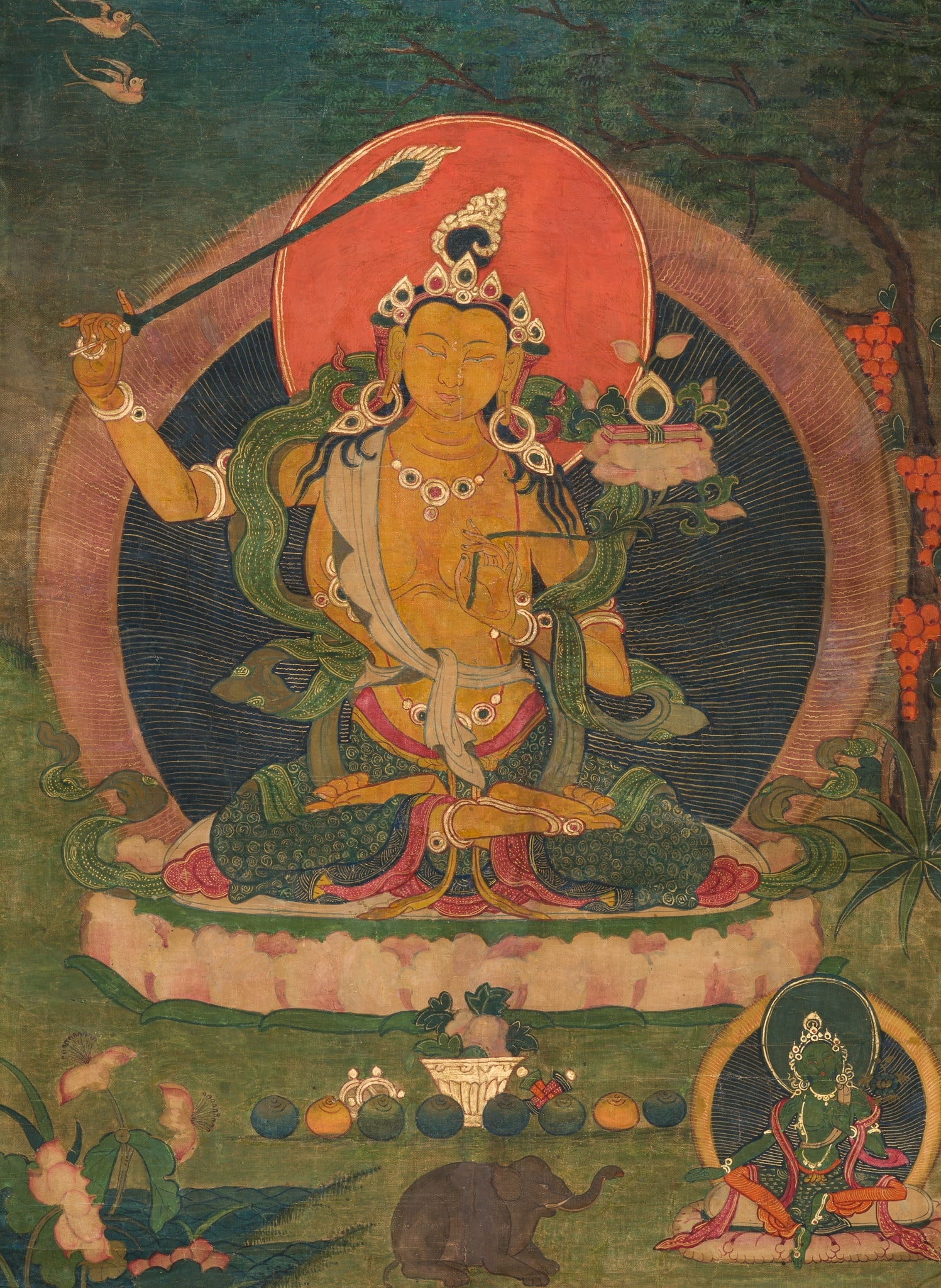 A THANGKA OF MANJUSHRI, 18TH-19TH CENTURY: A THANGKA OF MANJUSHRI, 18TH-19TH CENTURY Tibet. Distemper and gold on cloth. Mounted as a hanging scroll with a brocade frame. Manjushri is seated in dhyanasana on a lotus throne, his right hand hold