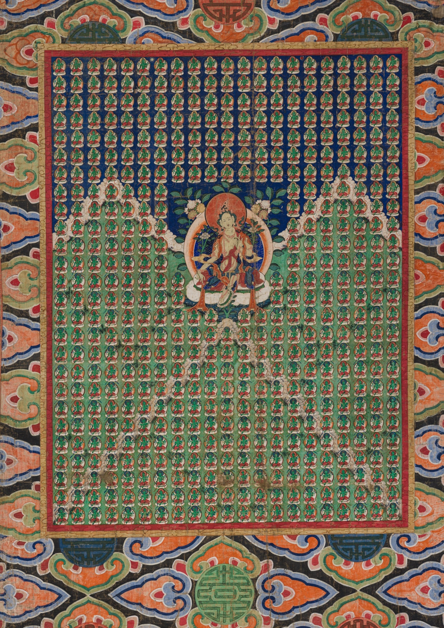 A FINE THANGKA DEPICTING WHITE TARA SURROUNDED BY 731 EMANATIONS OF GREEN TARA, TIBETAN-CHINESE, (1 of 12)