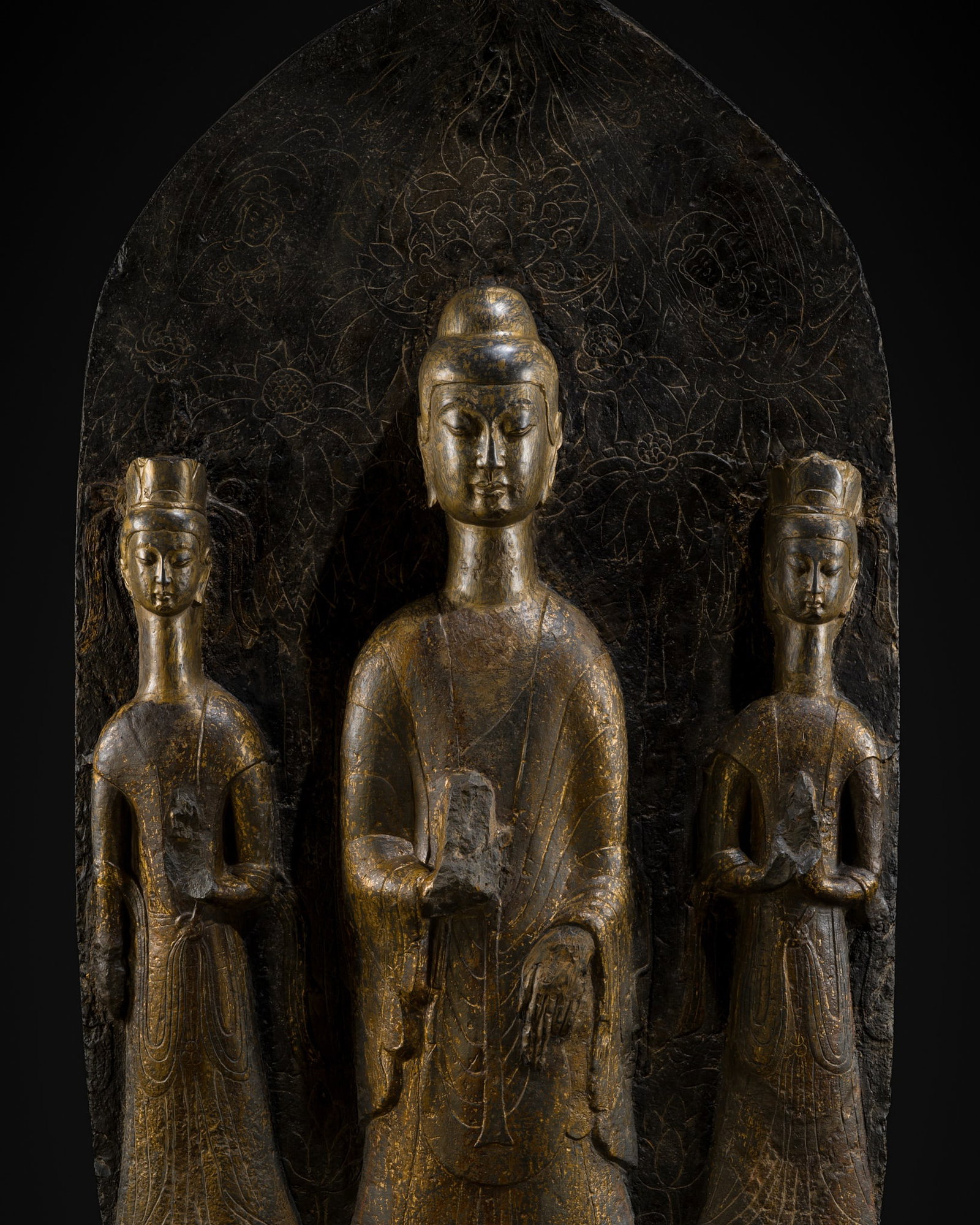 A VERY LARGE AND IMPORTANT LIMESTONE 'LONG-NECK' STELE OF SHAKYAMUNI, AVALOKITESHVARA, AND (1 of 20)
