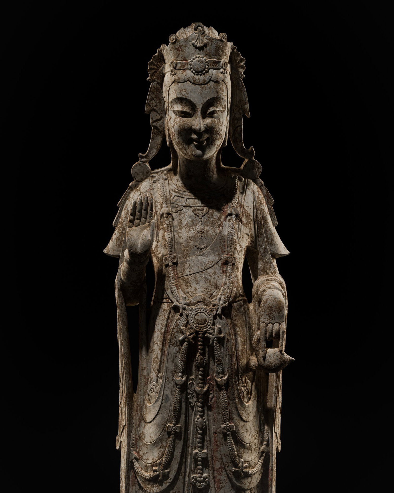 A VERY WELL-PRESERVED LIMESTONE FIGURE OF A BODHISATTVA, NORTHERN QI DYNASTY (1 of 14)