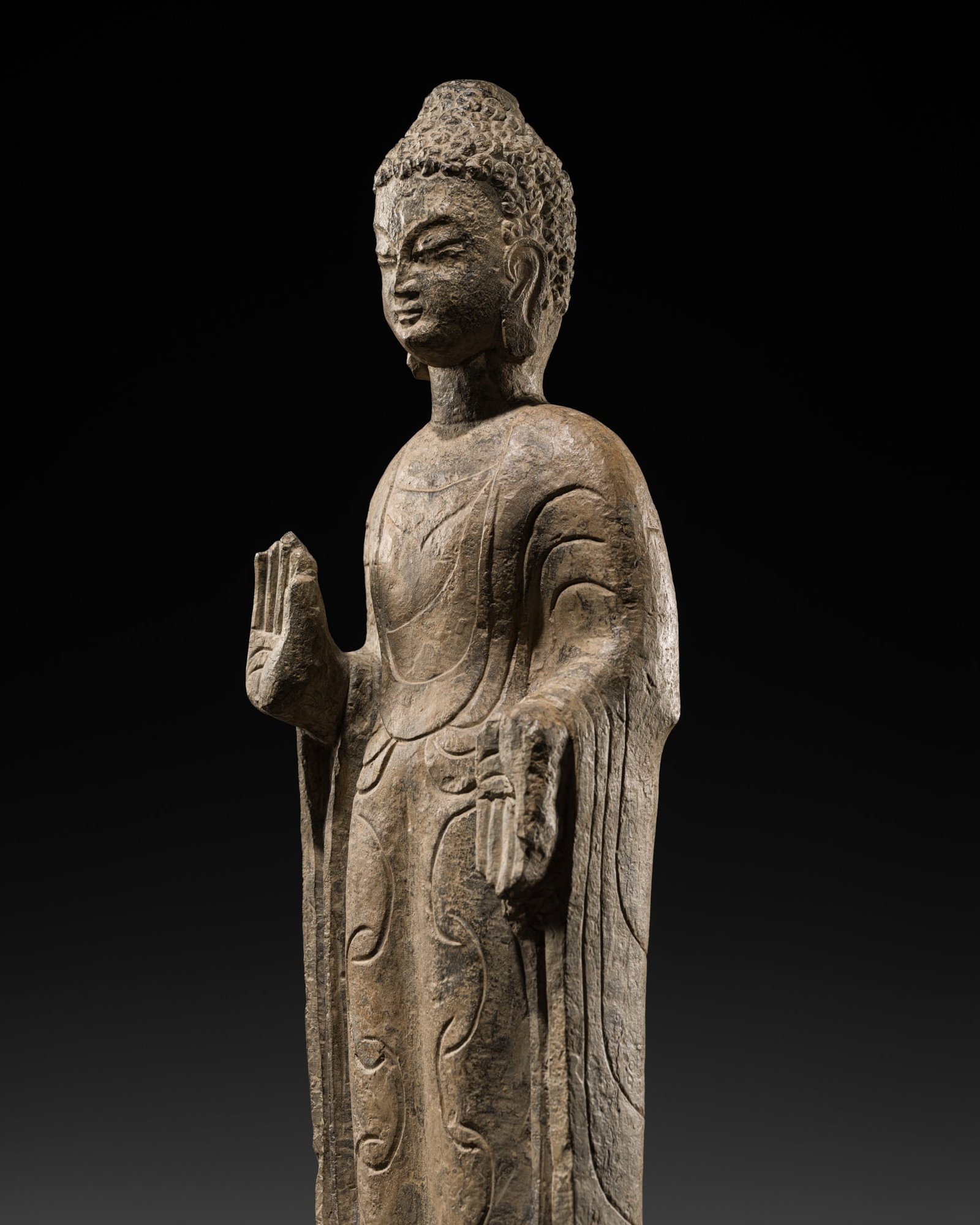 A LARGE STONE FIGURE OF BUDDHA SHAKYAMUNI, NORTHERN ZHOU-SUI DYNASTY, 6TH DYNASTY (1 of 12)