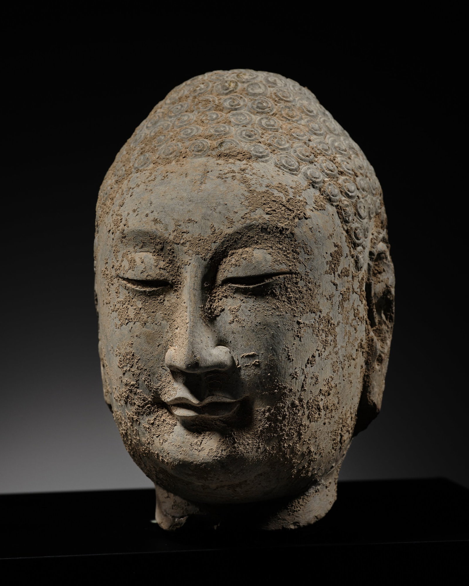 A FINE LIMESTONE HEAD OF BUDDHA, NORTHERN QI DYNASTY (1 of 13)