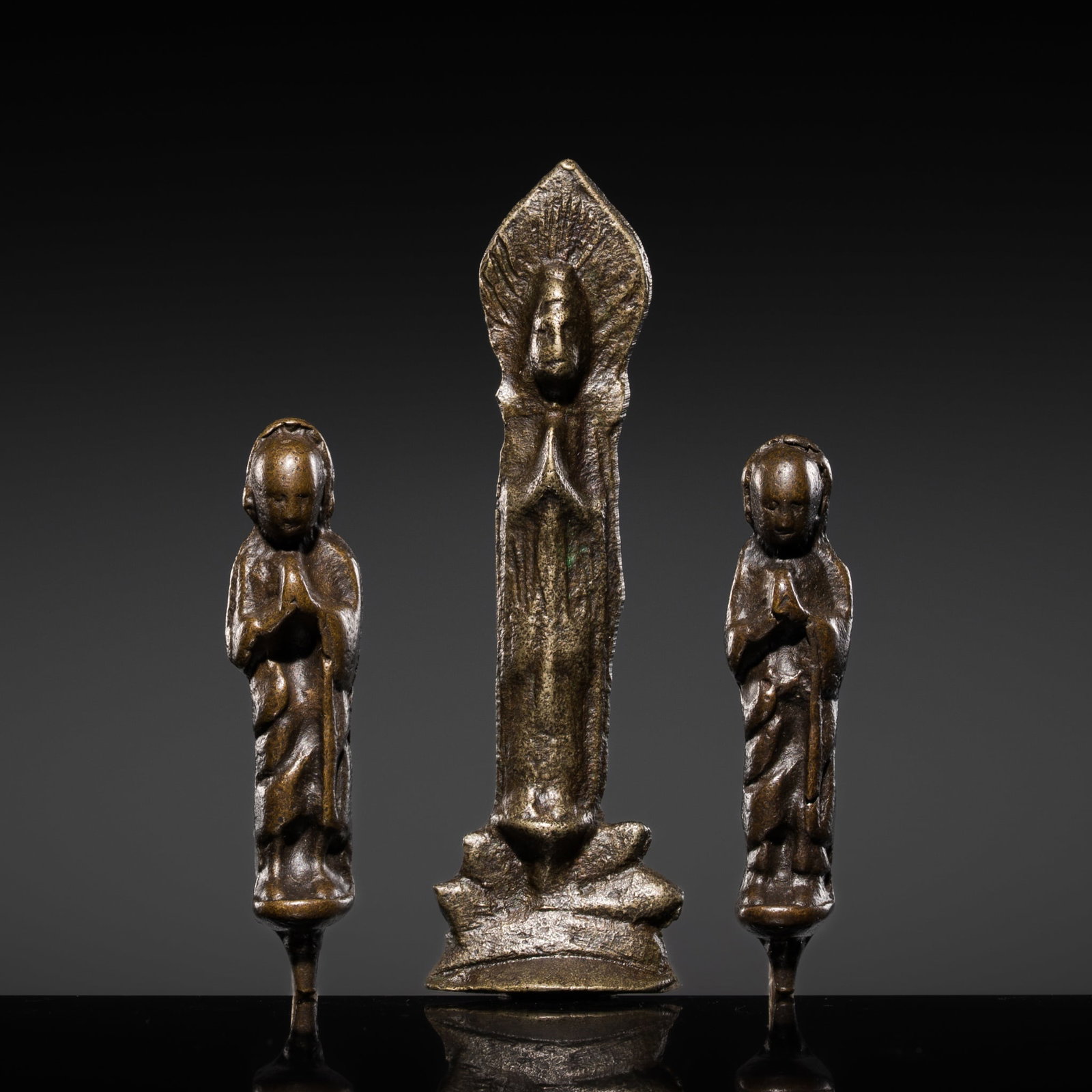 A RARE BRONZE TRIAD OF BUDDHA WITH ANANDA AND KASHYAPA, NORTHERN WEI-EARLY TANG DYNASTY (1 of 11)