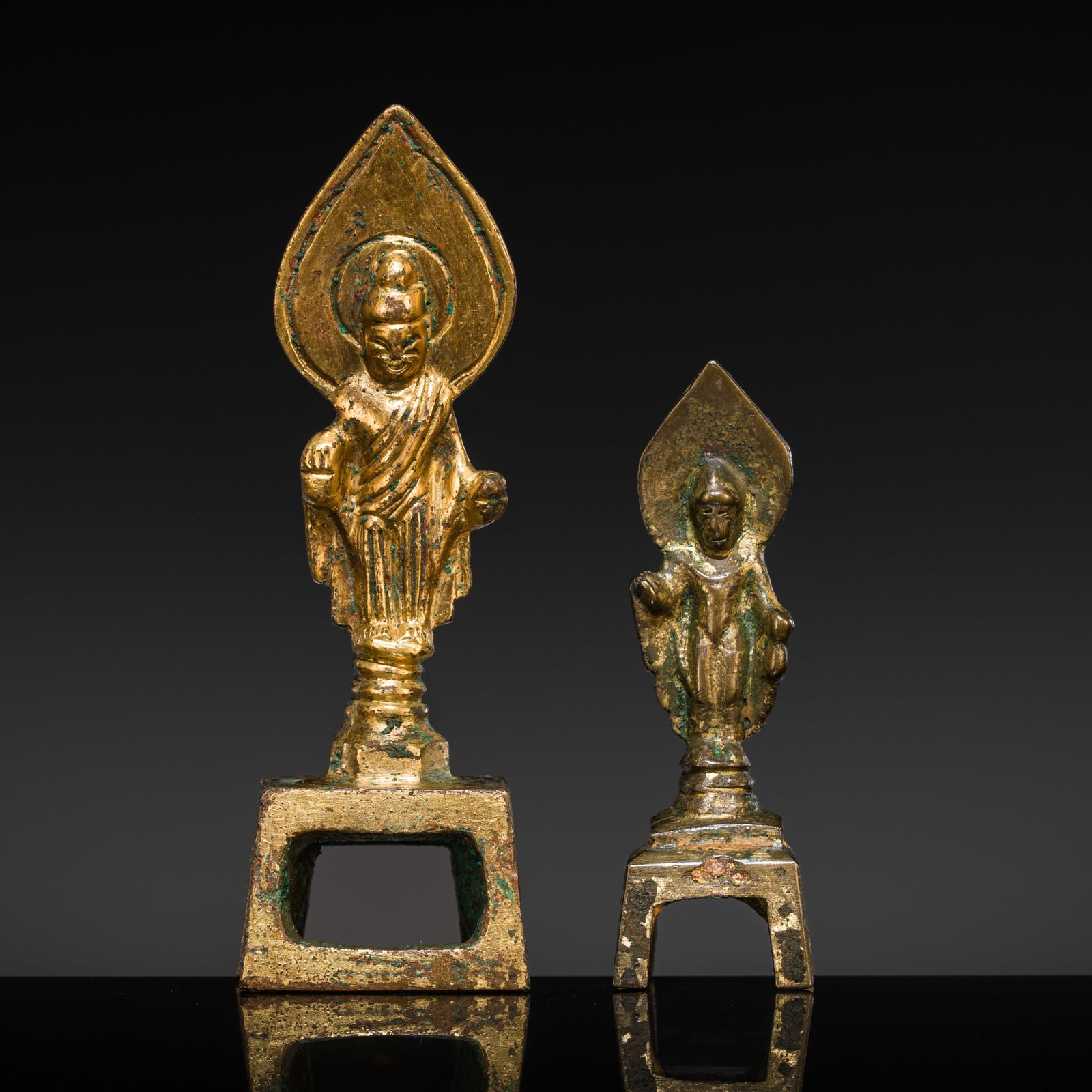 A GROUP OF TWO GILT-BRONZE FIGURES OF BUDDHA, SUI-TANG DYNASTY (1 of 14)