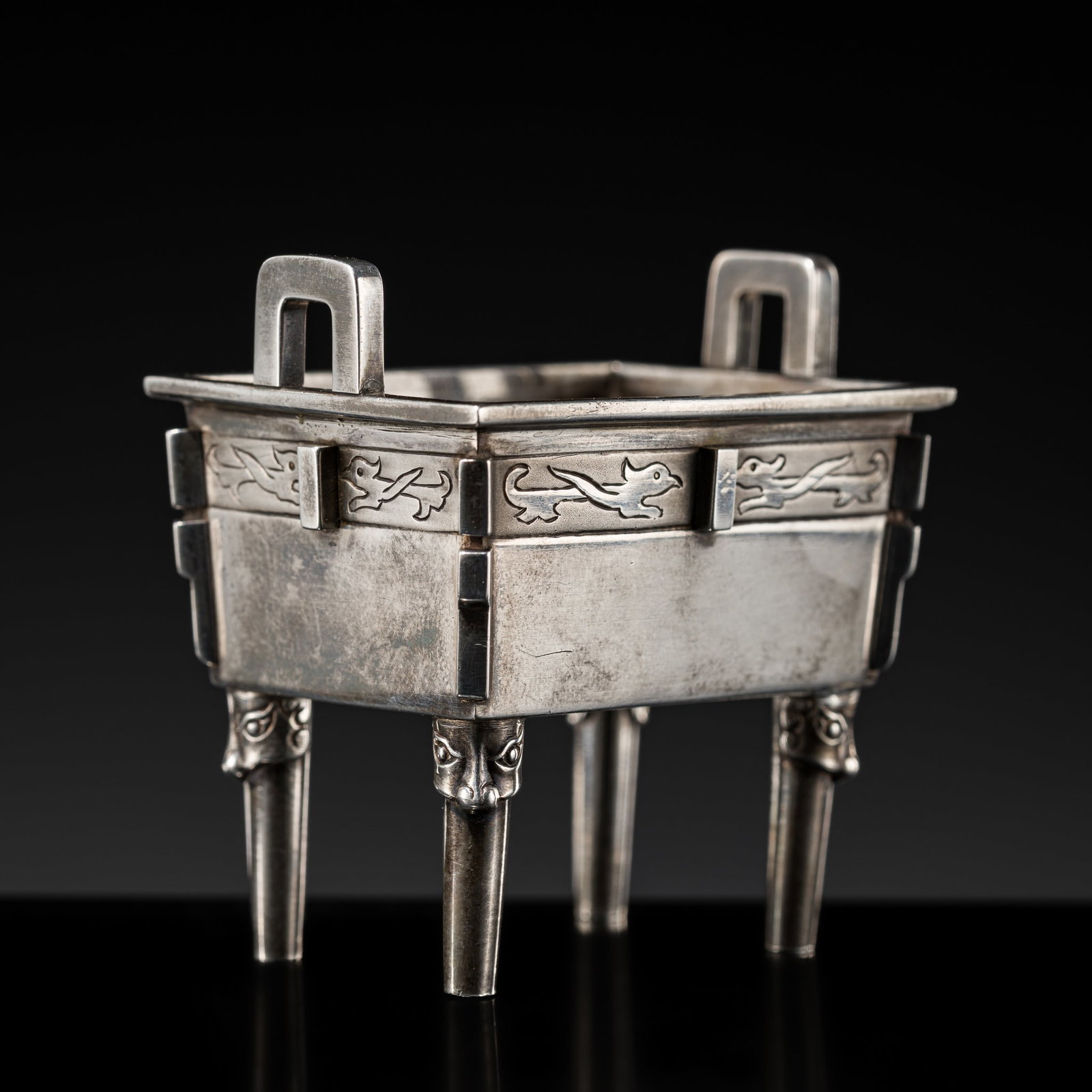 A MINIATURE ARCHAISTIC SILVER RITUAL INCENSE BURNER, FANGDING, LATE QING DYNASTY: A MINIATURE ARCHAISTIC SILVER RITUAL INCENSE BURNER, FANGDING, LATE QING DYNASTY Published & Exhibited: Ben Janssens Oriental Art, In Scholar's Taste, London, 2016, p. 58-59, no. 27. China, 19th