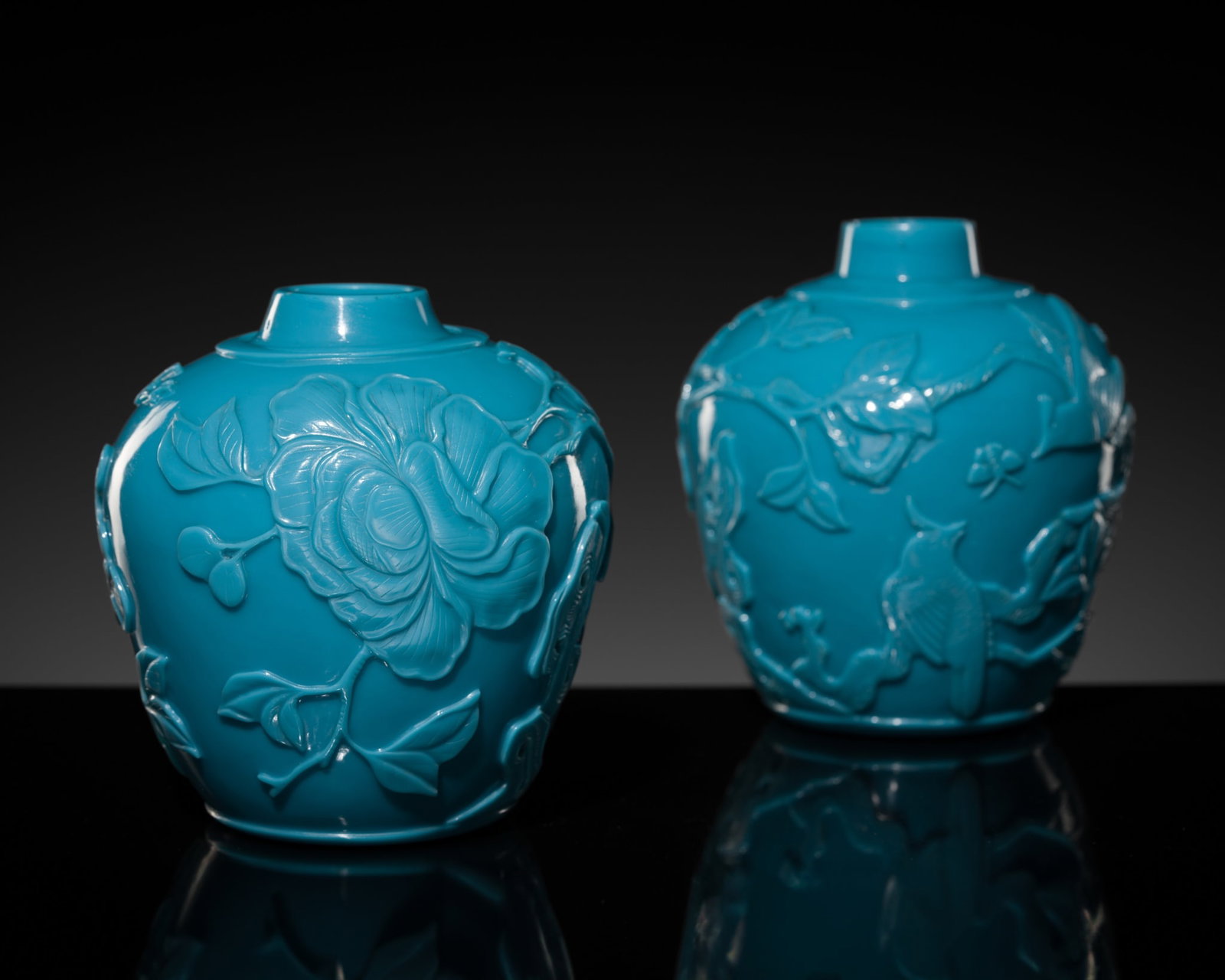 AN UNUSUAL PAIR OF CARVED OPAQUE TURQUOISE GLASS 'BIRDS AND FLOWERS' VASES, QING DYNASTY (1 of 16)