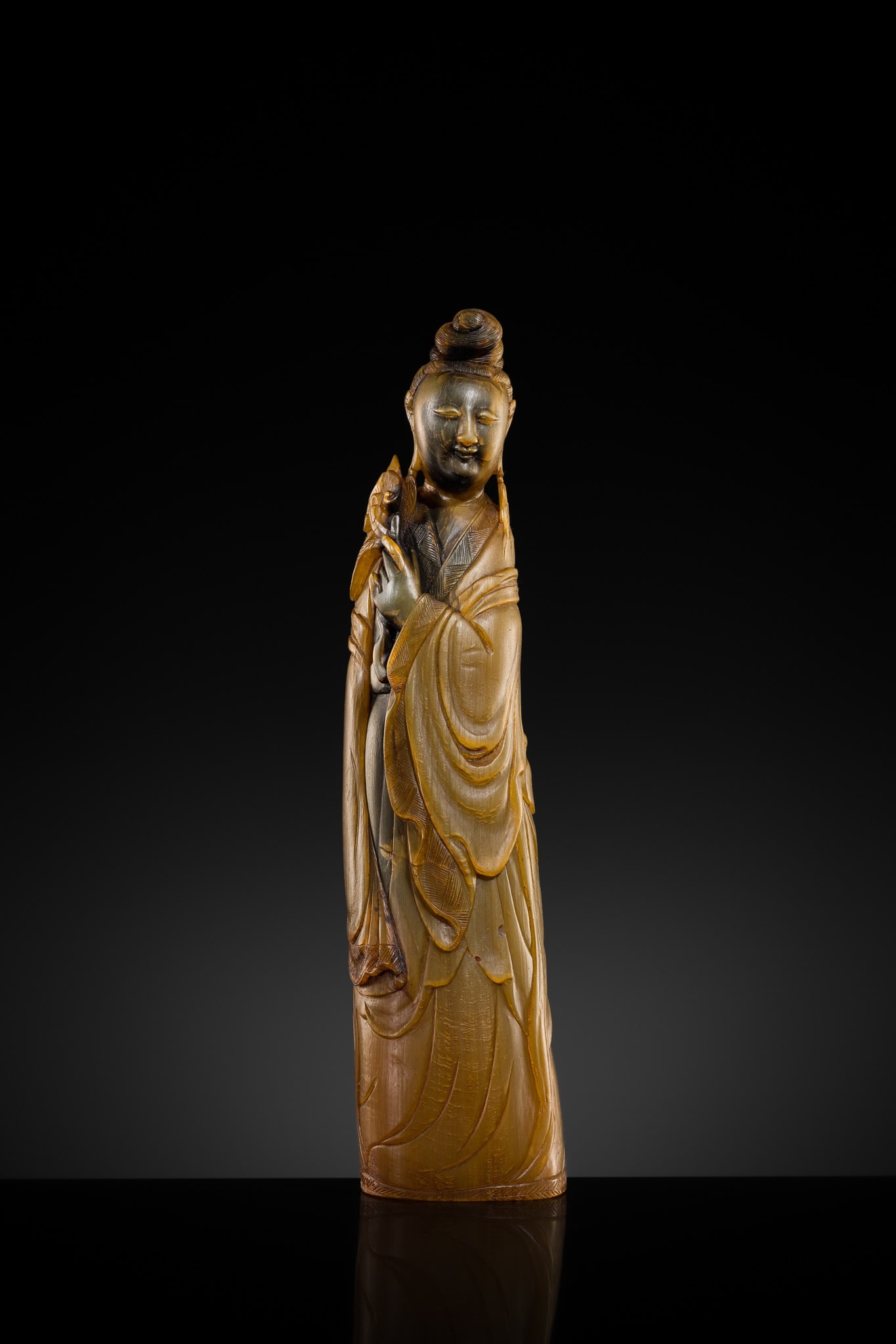 A FINE BUFFALO HORN FIGURE OF THE QUEEN MOTHER OF THE WEST, XI WANGMU, 18TH-19TH CENTURY (1 of 11)