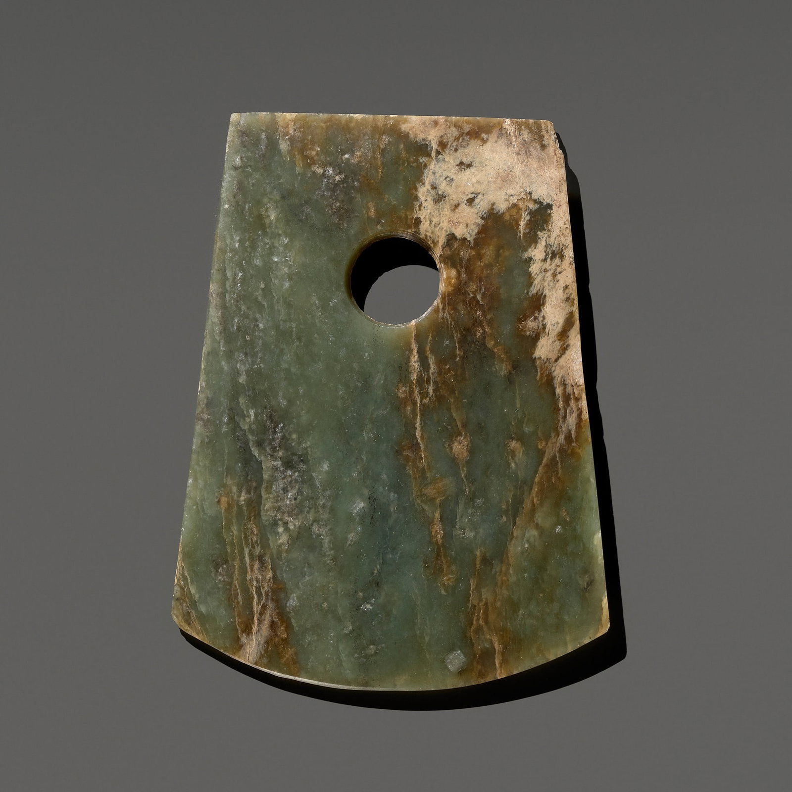 A RARE GREEN JADE AXE, YUE, NEOLITHIC PERIOD (1 of 12)