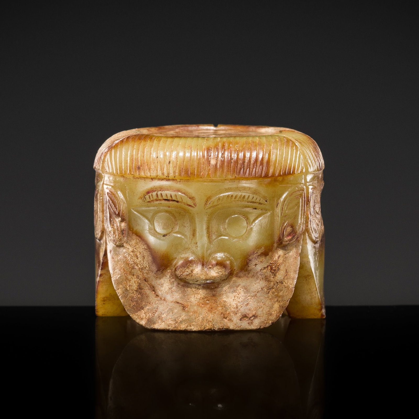 A RARE 'FU HAO TYPE' YELLOW AND RUSSET JADE 'THREE-HEADED HUMAN' PENDANT, SHANG DYNASTY (1 of 13)