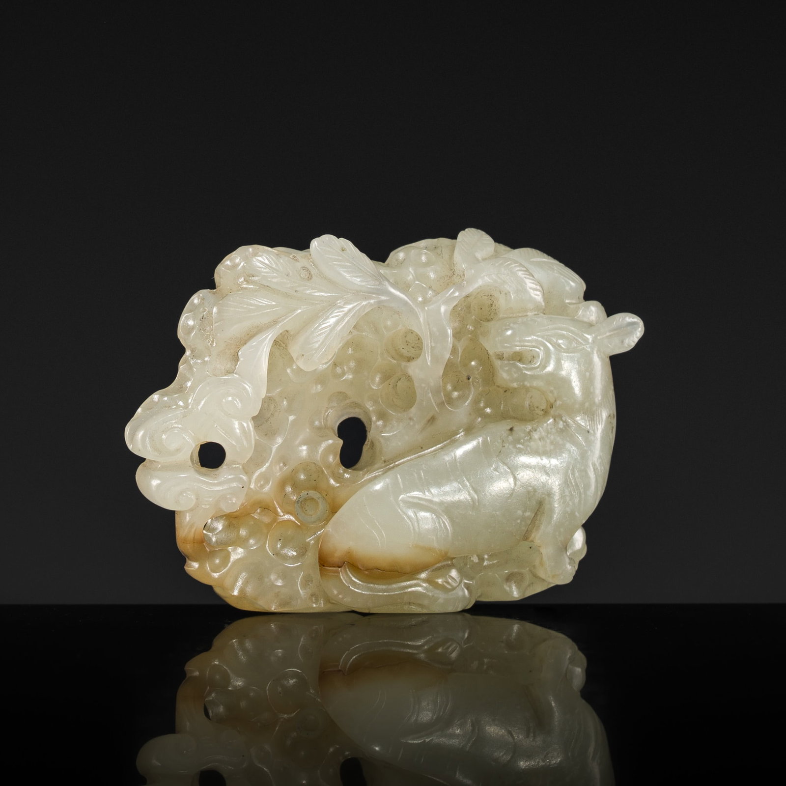 A PALE CELADON AND RUSSET JADE 'TIGER AND LINGZHI' PLAQUE, LIAO-JIN DYNASTY (1 of 12)