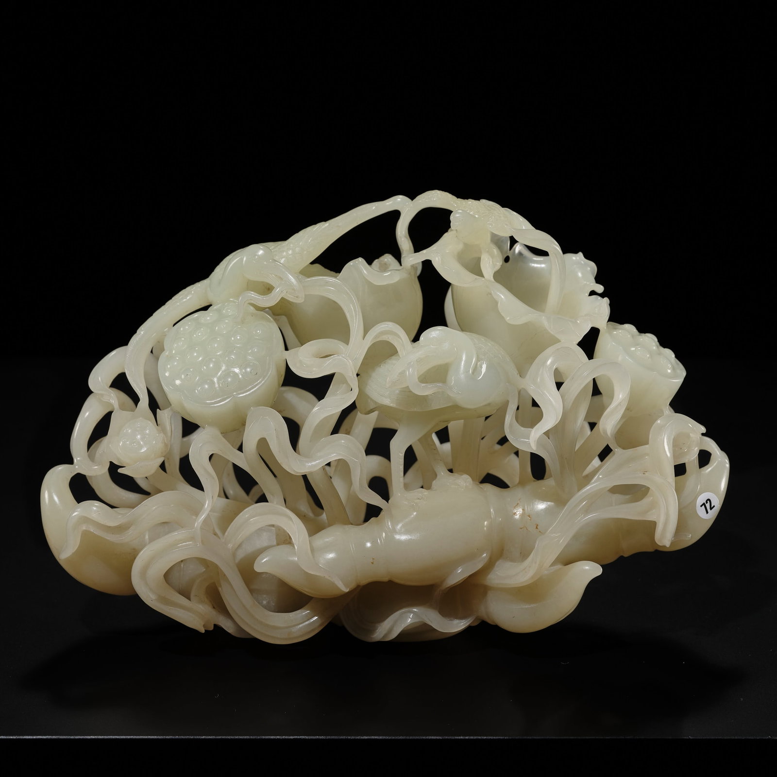 A SUPERB WHITE JADE RETICULATED 'EGRETS AND LOTUS' GROUP, CIRCA 1900 (1 of 15)