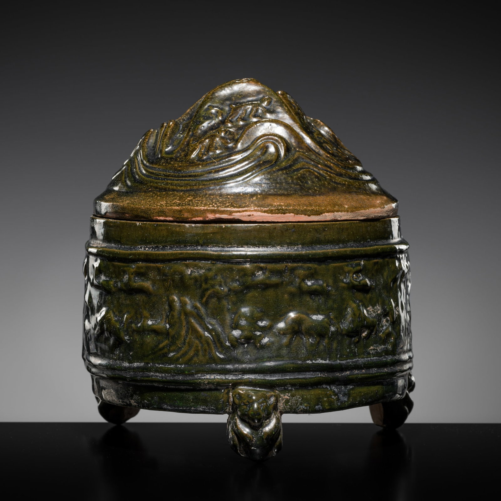 A GREEN-GLAZED POTTERY 'HILL' TRIPOD JAR AND COVER, LIAN, HAN DYNASTY (1 of 17)