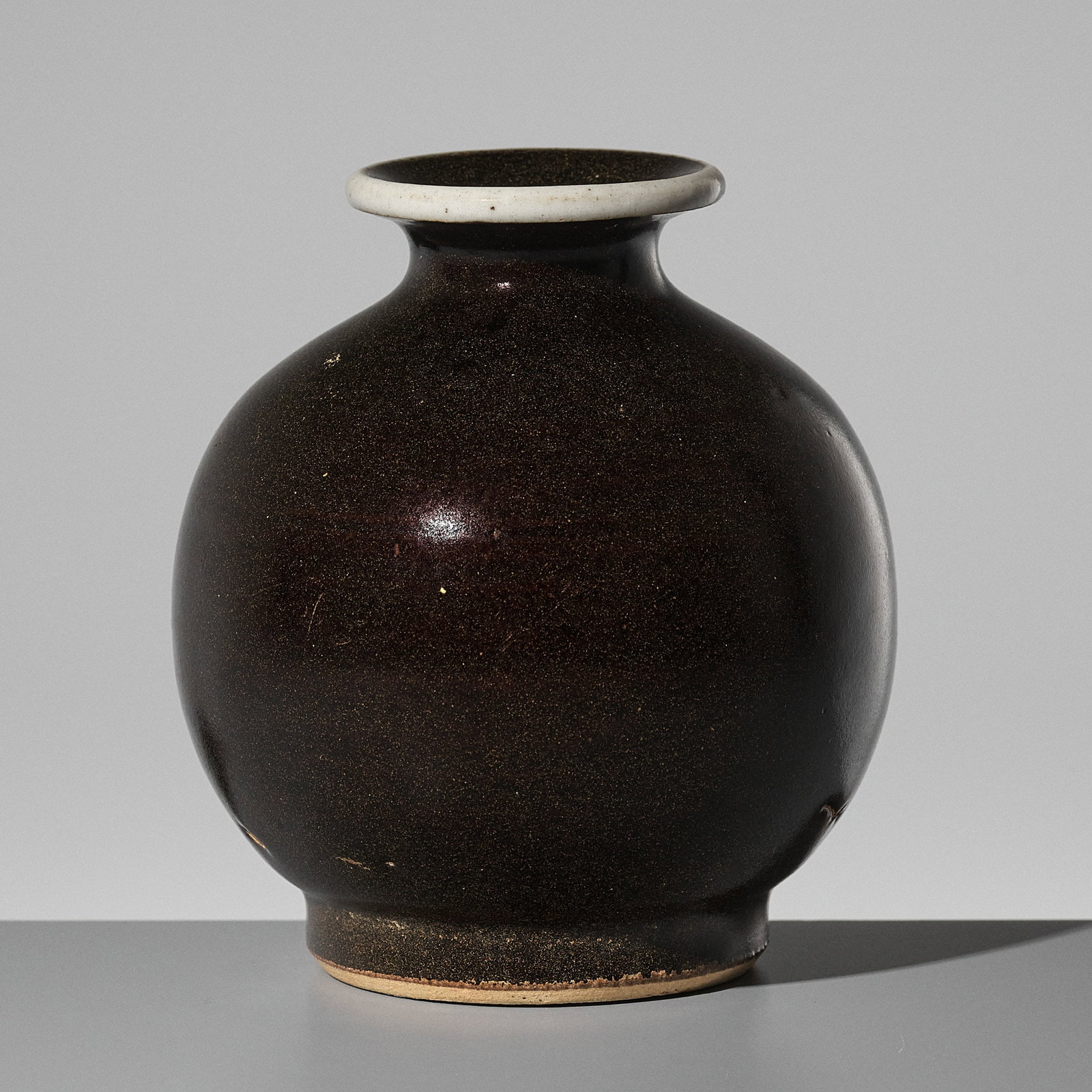 A CIZHOU WHITE-RIMMED GLOBULAR VASE, YUAN DYNASTY (1 of 9)