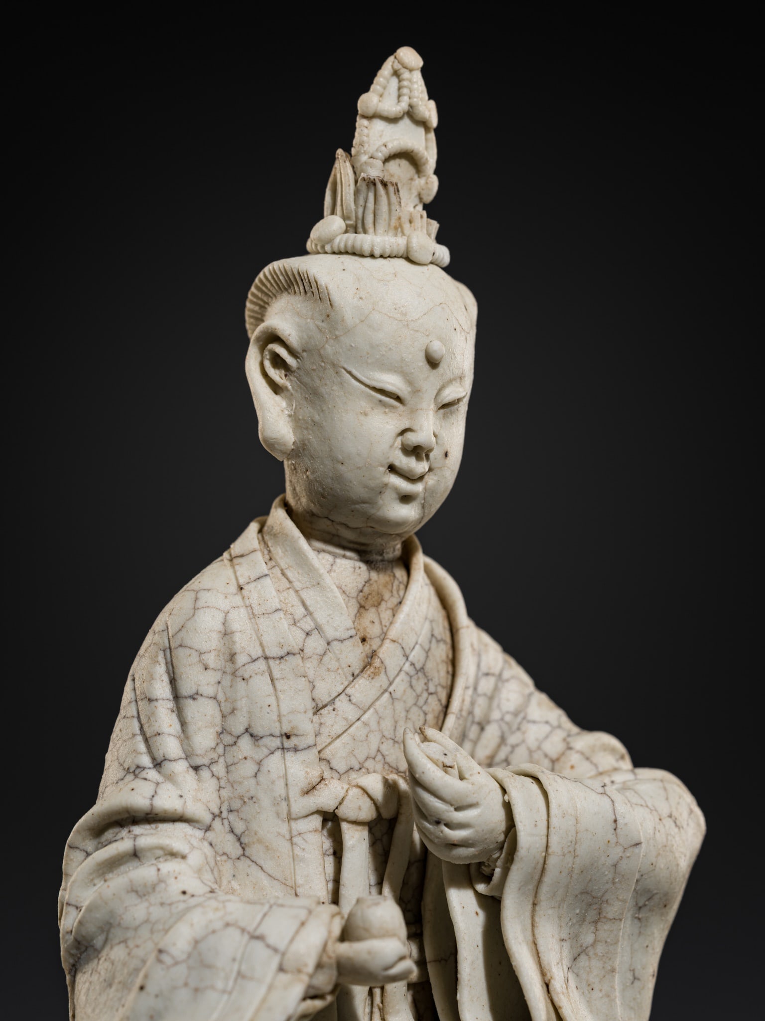 A RARE QINGBAI PARTIALLY-GLAZED FIGURE OF A DAOIST SAGE, SOUTHERN SONG DYNASTY, 13TH CENTURY (1 of 13)