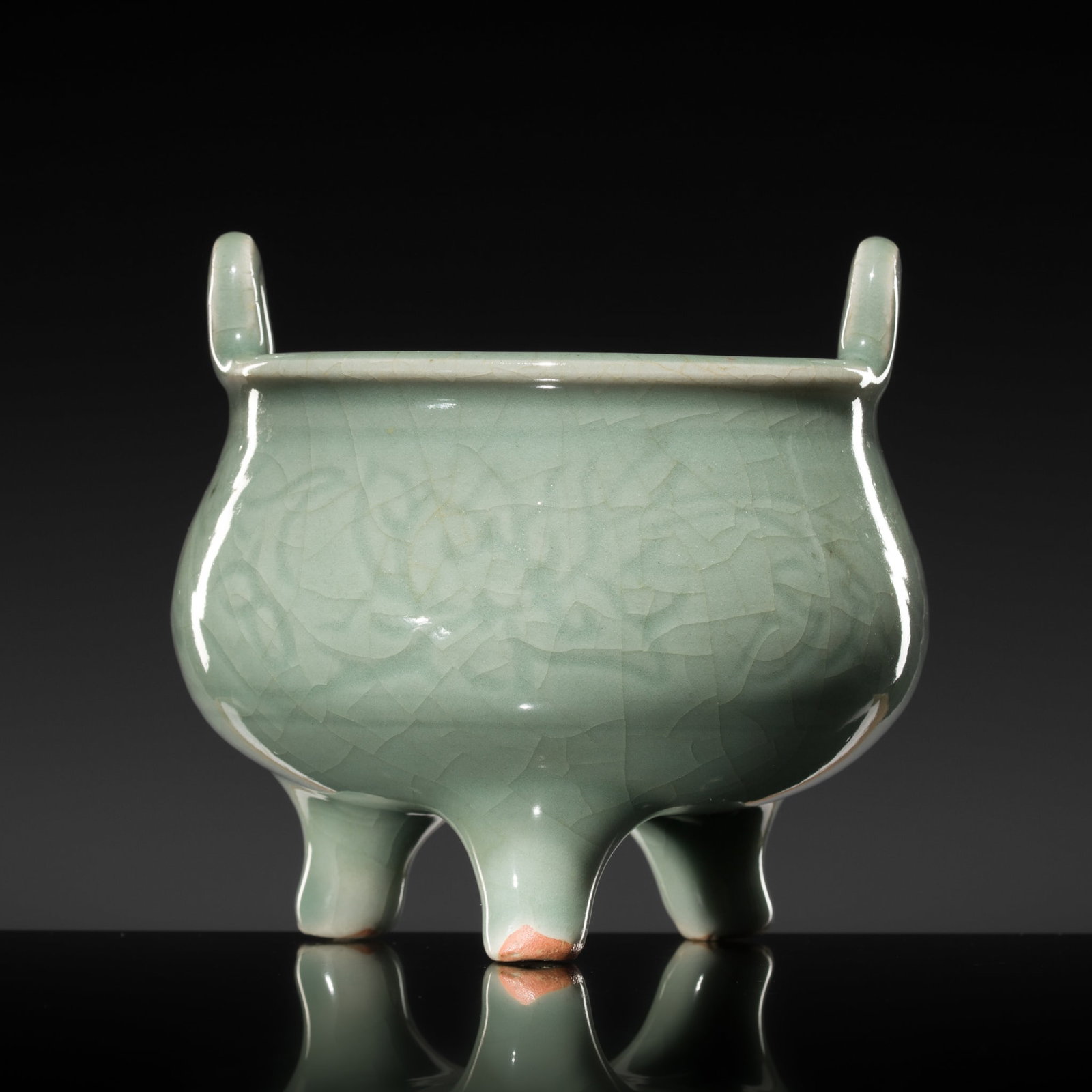 A CARVED LONGQUAN CELADON 'LOTUS' TRIPOD CENSER, MING DYNASTY (1 of 13)