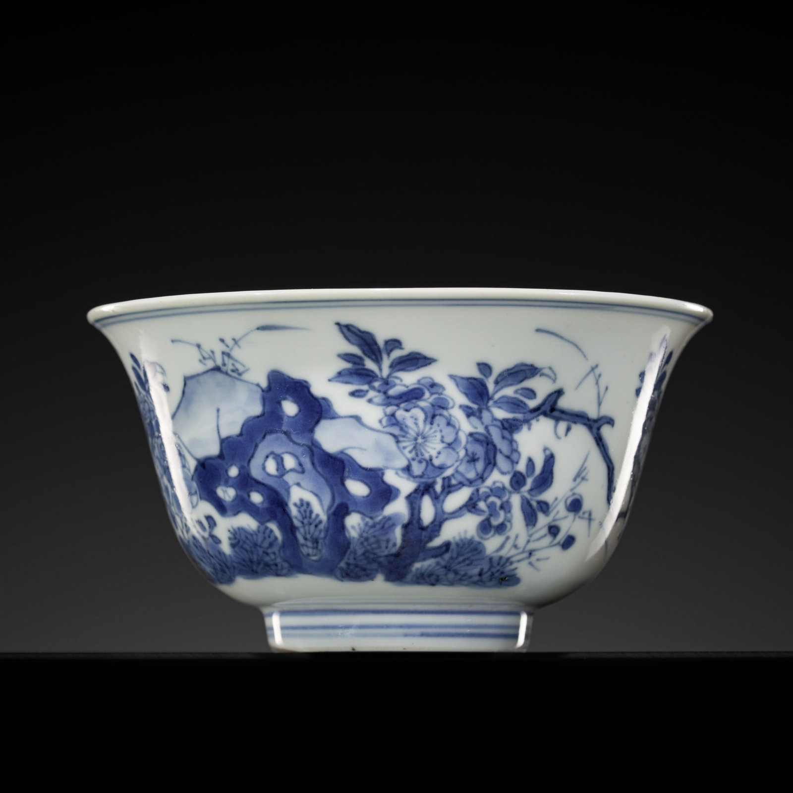 A BLUE AND WHITE 'CHRYSANTHEMUM AND CHERRY BLOSSOM' BOWL, CHANGQING MARK, KANGXI PERIOD (1 of 15)