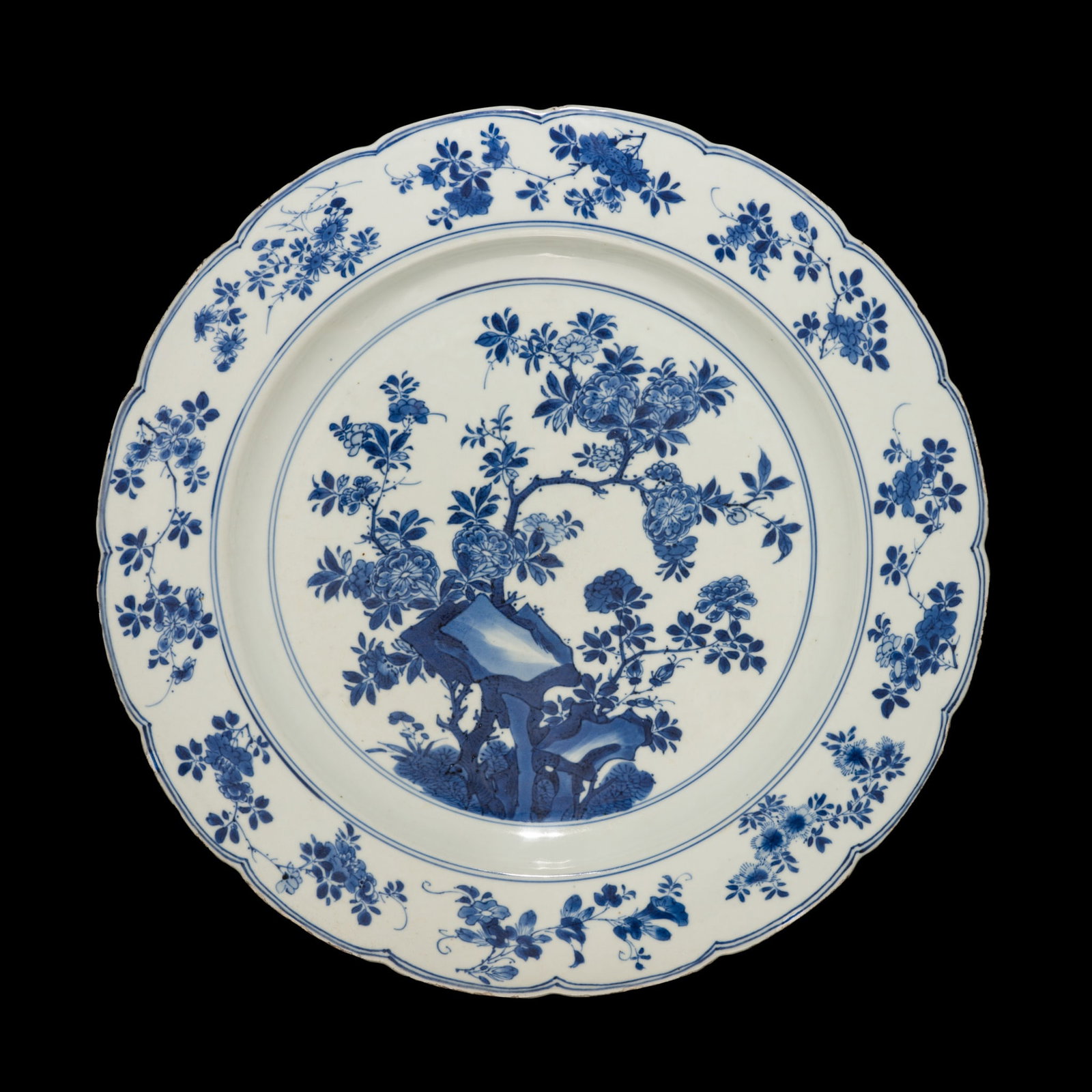 A BLUE AND WHITE 'PEONY' DISH, KANGXI MARK AND PERIOD (1 of 9)