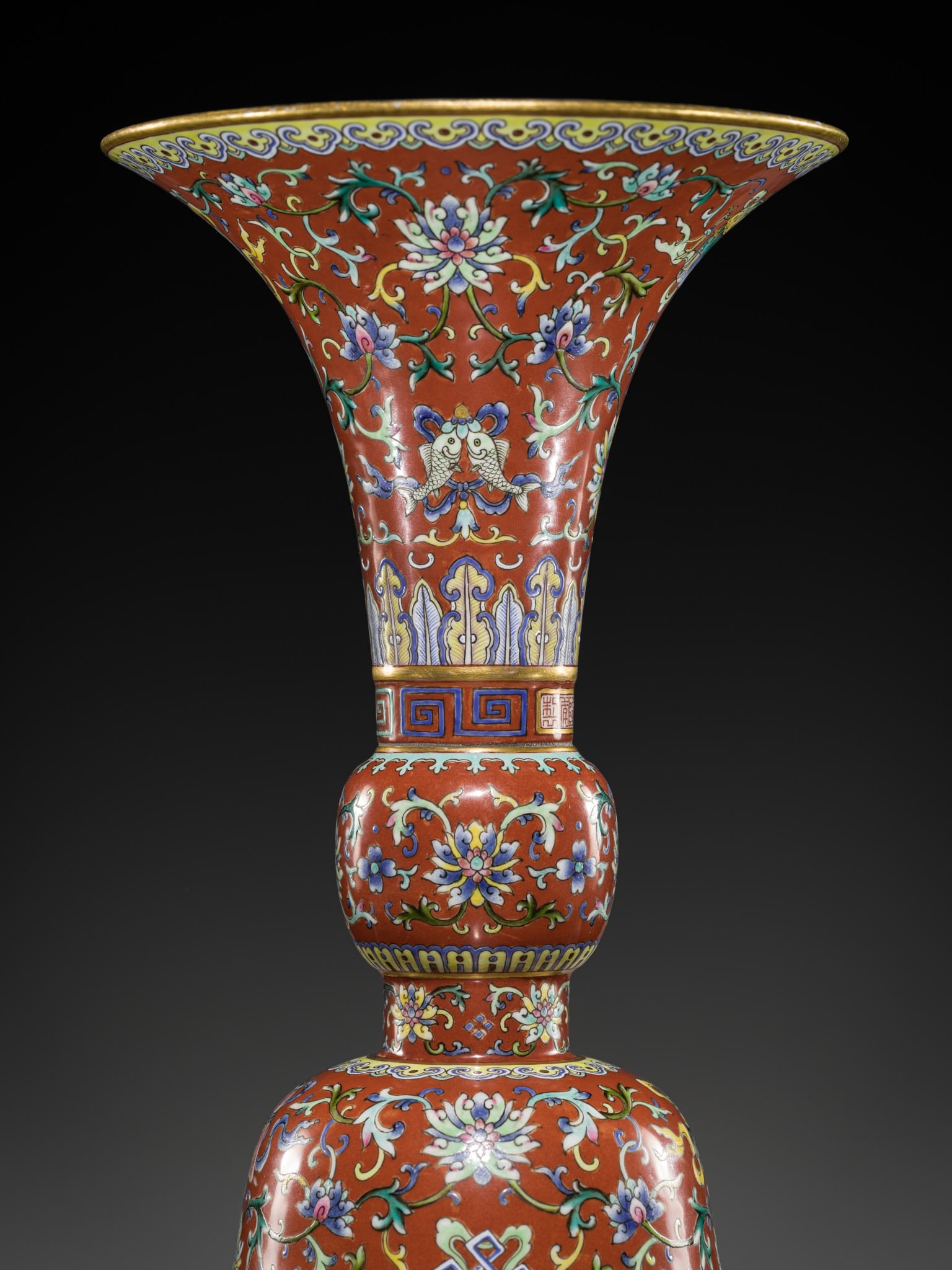 A CORAL-RED-GROUND FAMILLE-ROSE 'BAJIXIANG' ALTAR VASE, GU, QIANLONG MARK AND PERIOD (1 of 19)