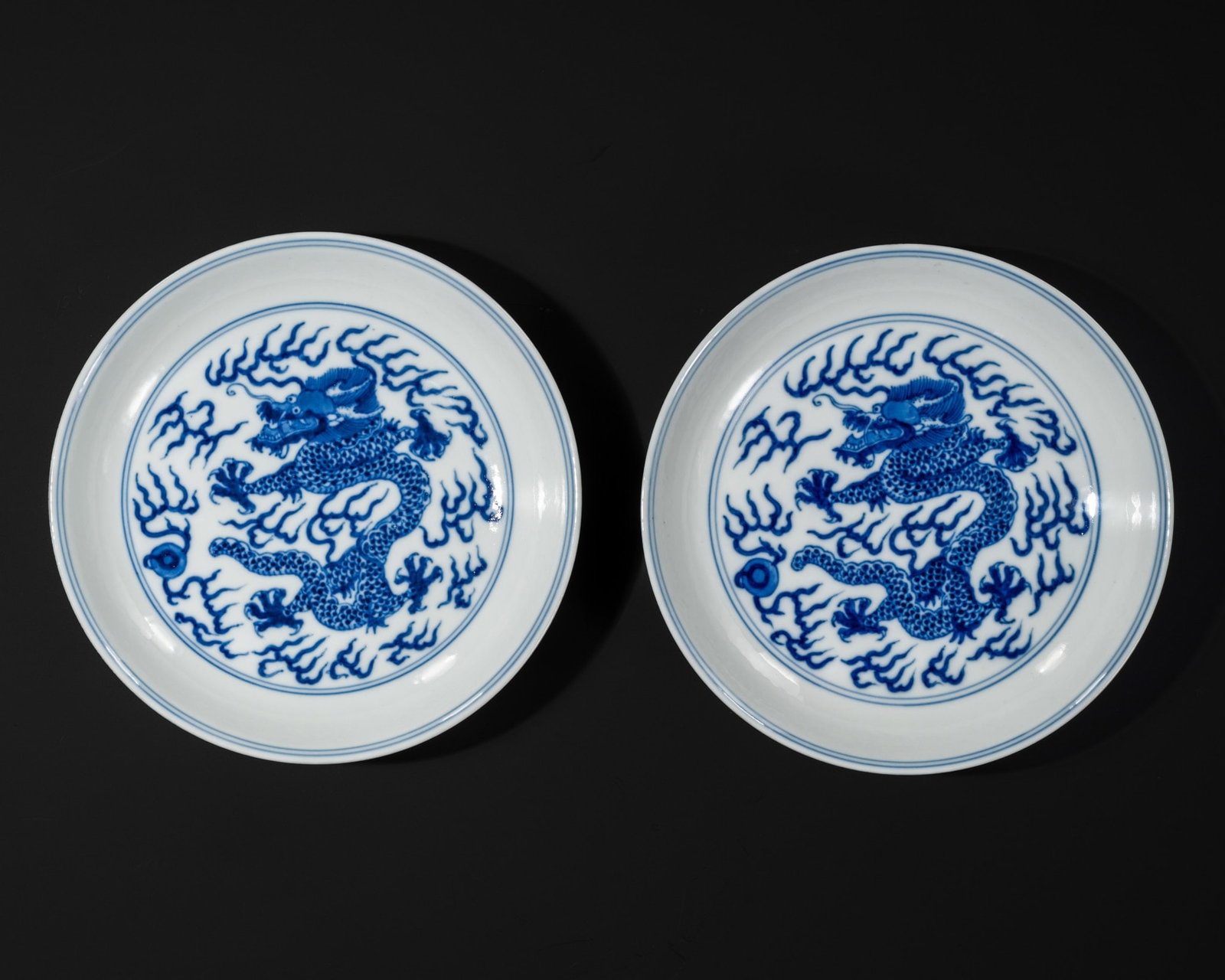 A PAIR OF BLUE AND WHITE 'DRAGON' DISHES, CHINA, DAOGUANG MARKS AND PERIOD (1 of 17)