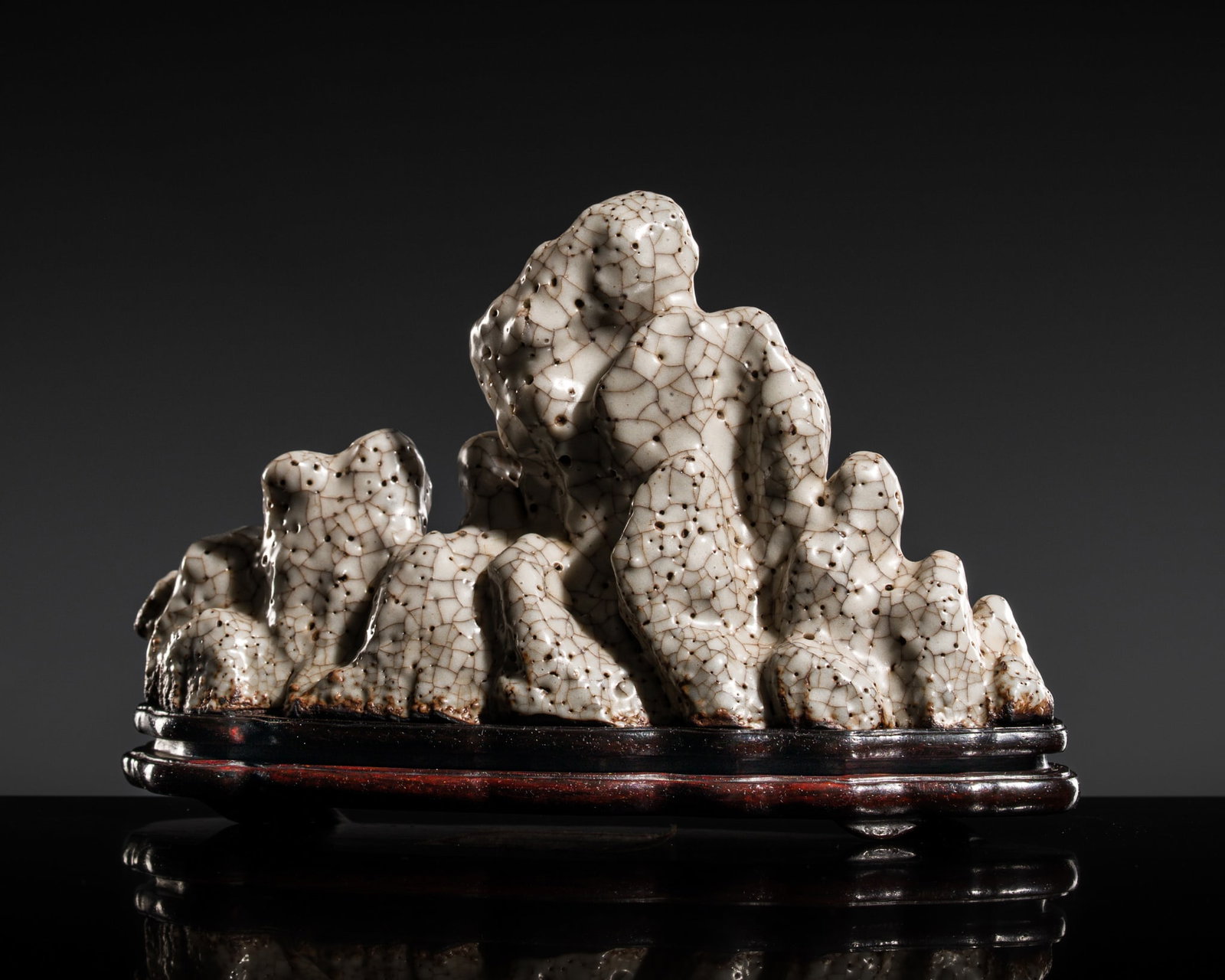 A GUAN-TYPE GLAZED 'SCHOLAR'S ROCK' BRUSH REST, 19TH CENTURY (1 of 14)