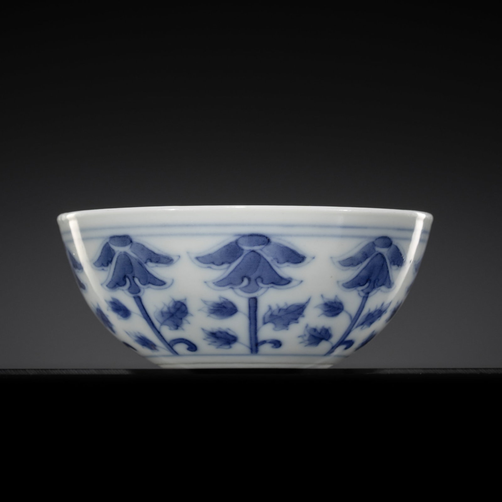 A BLUE AND WHITE 'FLORAL' WINE CUP, GUANGXU MARK AND PERIOD (1 of 12)