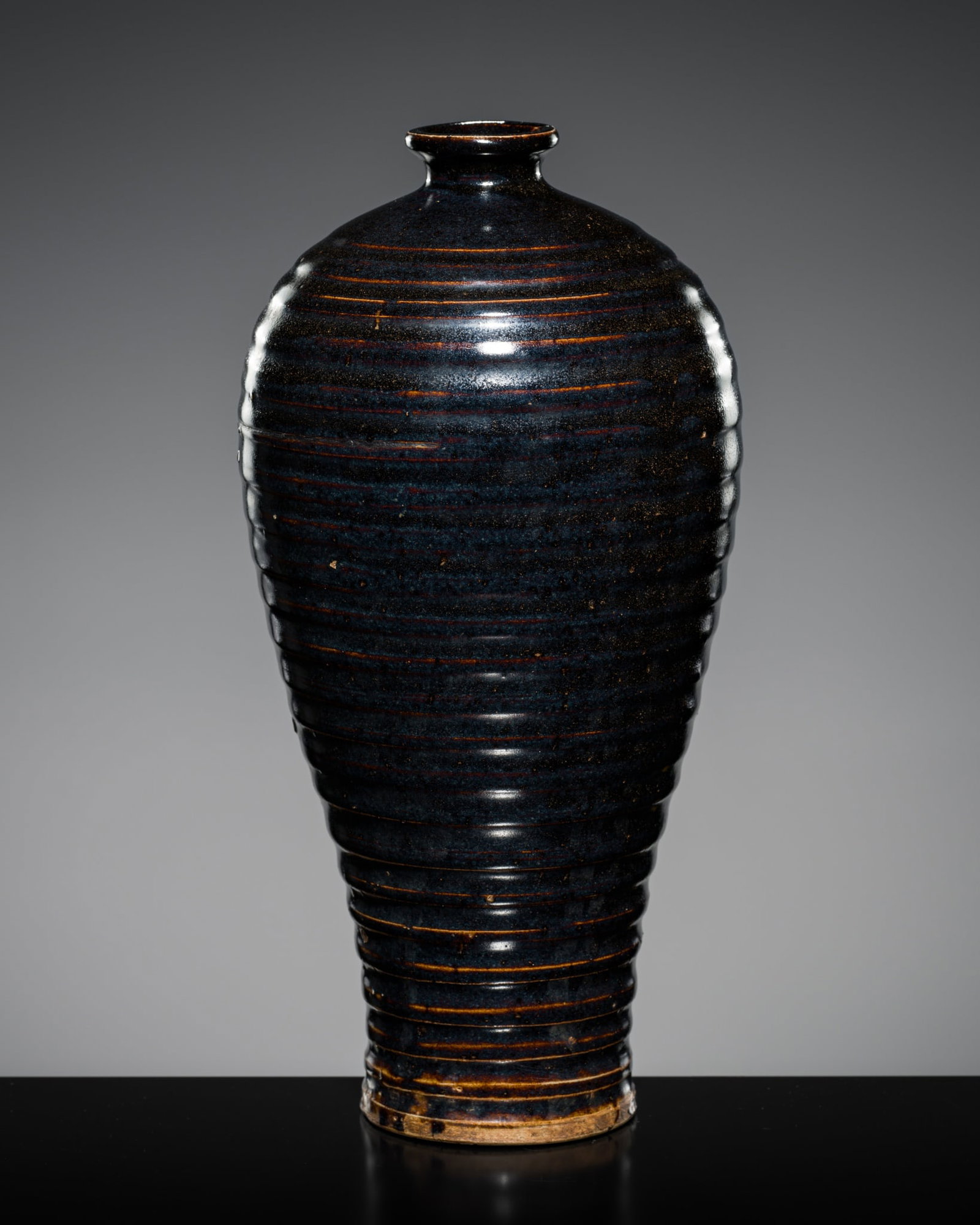 A BLACK-GLAZED RIBBED MEIPING, REPUBLIC PERIOD OR EARLIER (1 of 11)