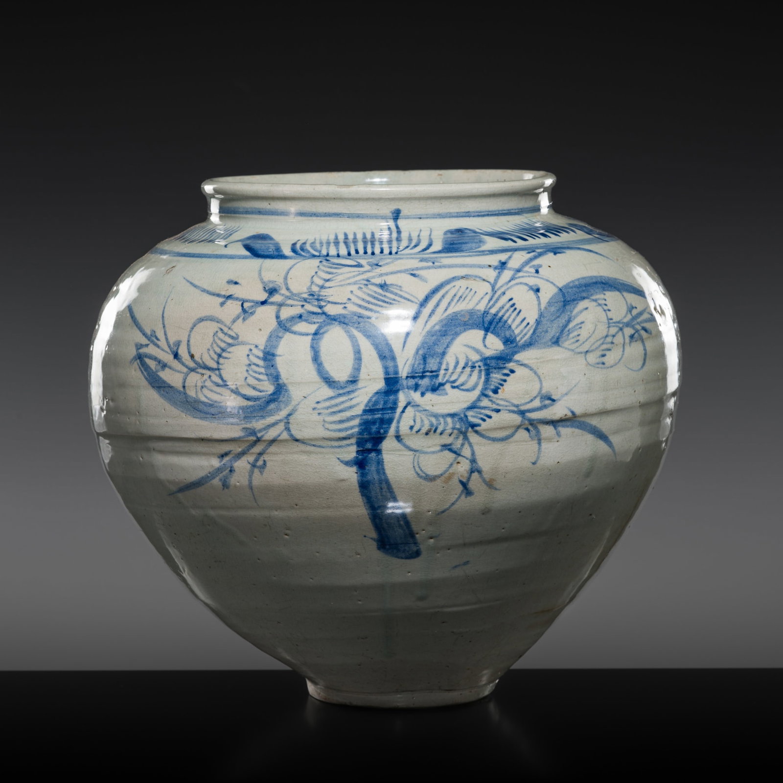 A LARGE BLUE AND WHITE 'FLORAL' JAR, JOSEON DYNASTY, 18TH CENTURY: A LARGE BLUE AND WHITE 'FLORAL' JAR, JOSEON DYNASTY, 18TH CENTURY Scientific Analysis Report: A thermoluminescence analysis report issued by Oxford Authentication on 4 March 2025, based on sample numb