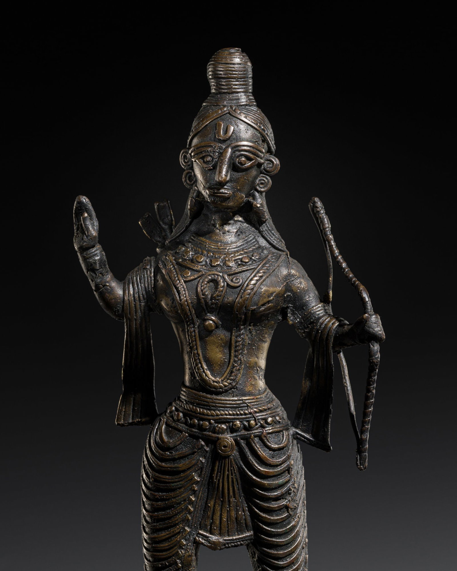 A KONDH TRIBAL BRONZE FIGURE OF KARTIKEYA, ORISSA, 19TH CENTURY (1 of 8)