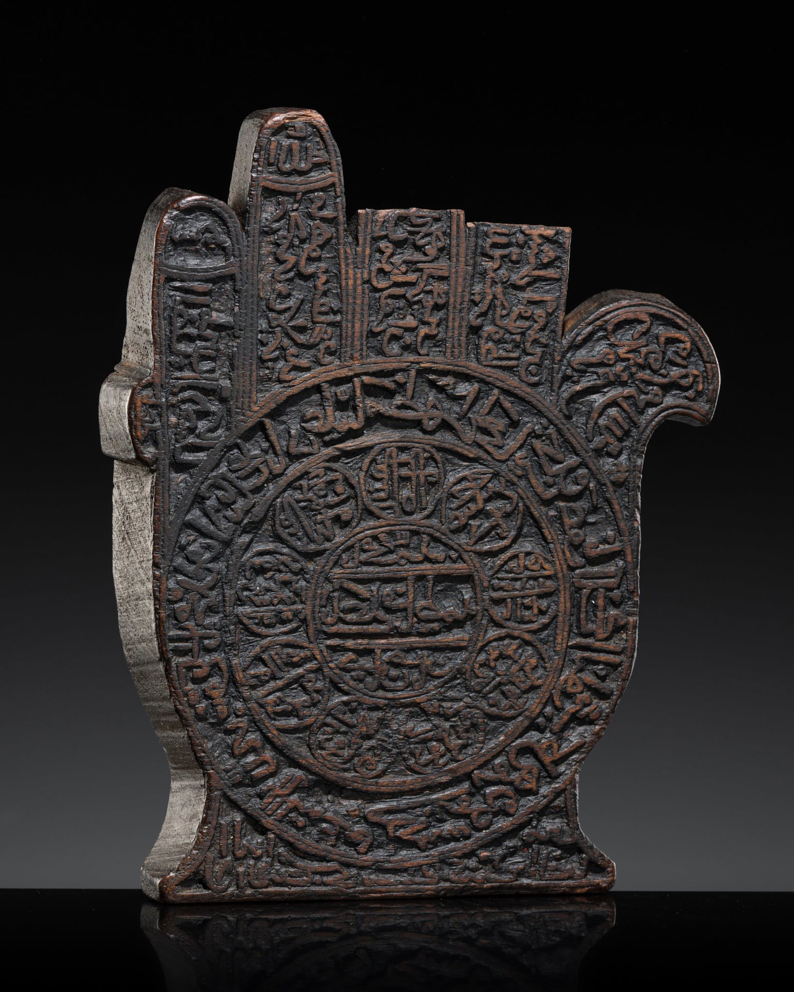 A CARVED WOOD HAND OF FATIMA, HAMSA, INDIA, 19TH CENTURY (1 of 12)