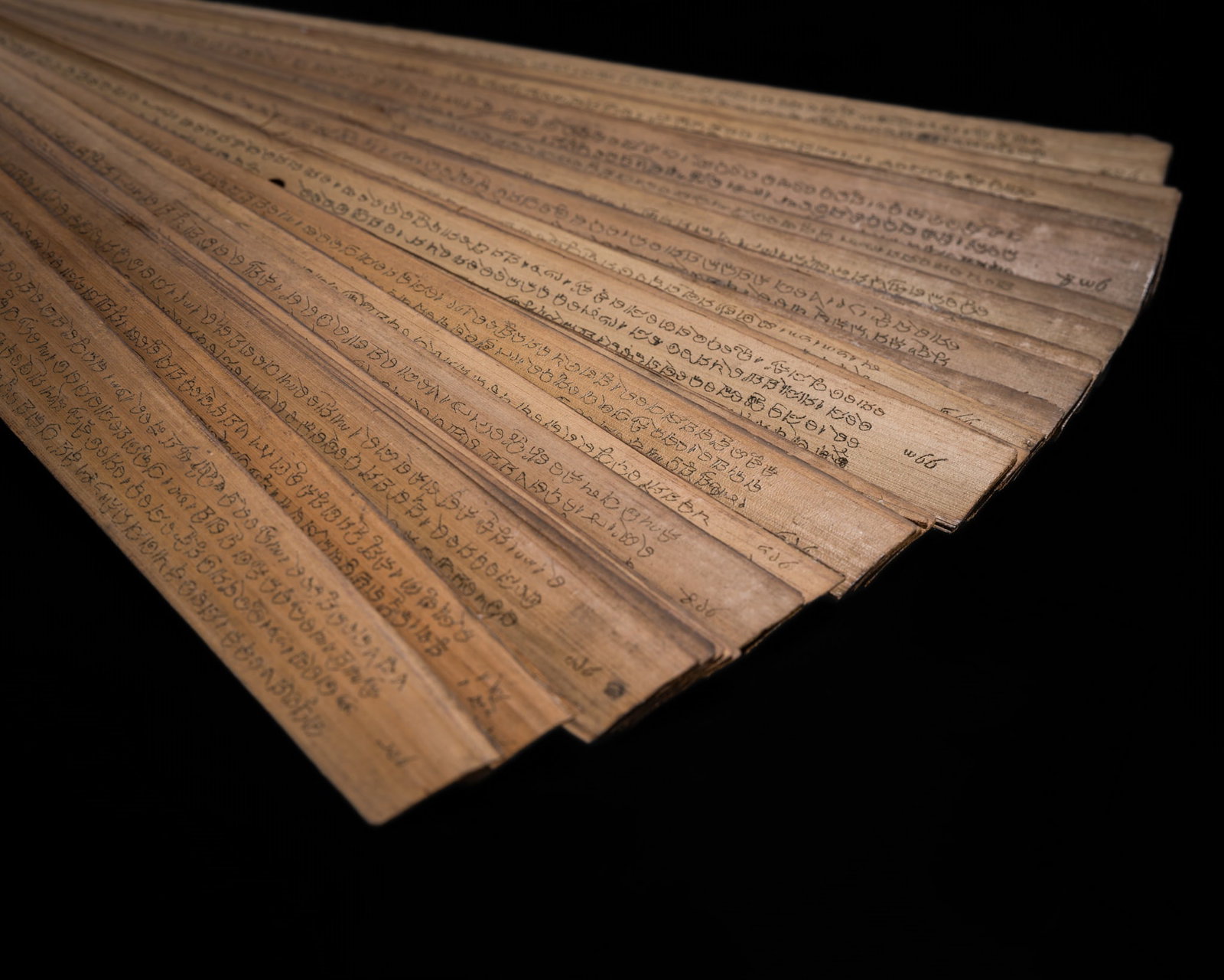 A PALM LEAF MANUSCRIPT WRITTEN IN ORIYA SCRIPT, LATE 17TH-18TH CENTURY (1 of 11)
